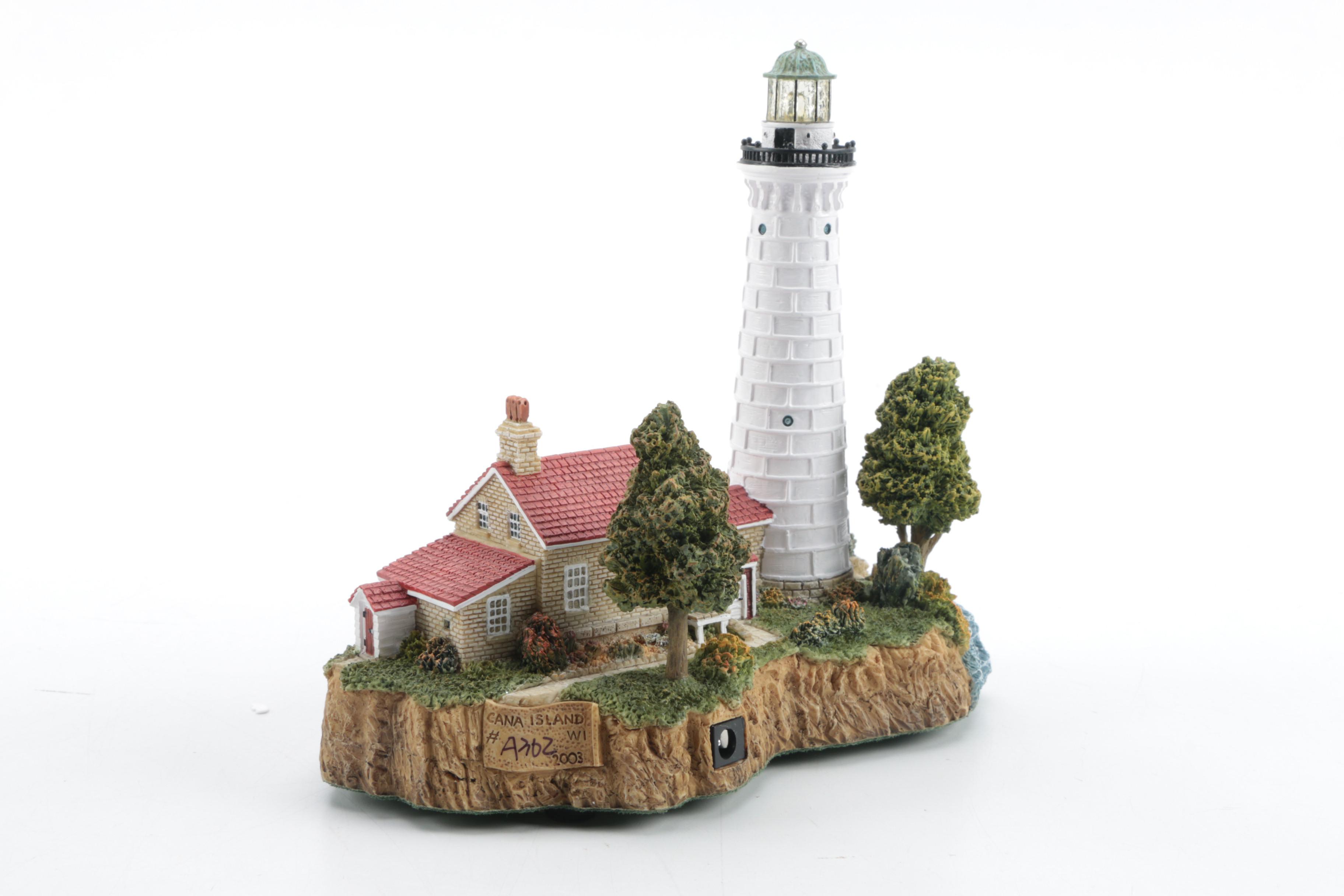 Harbour Lights Collectible Fresnel Light and Resin Lighthouse Sculpture