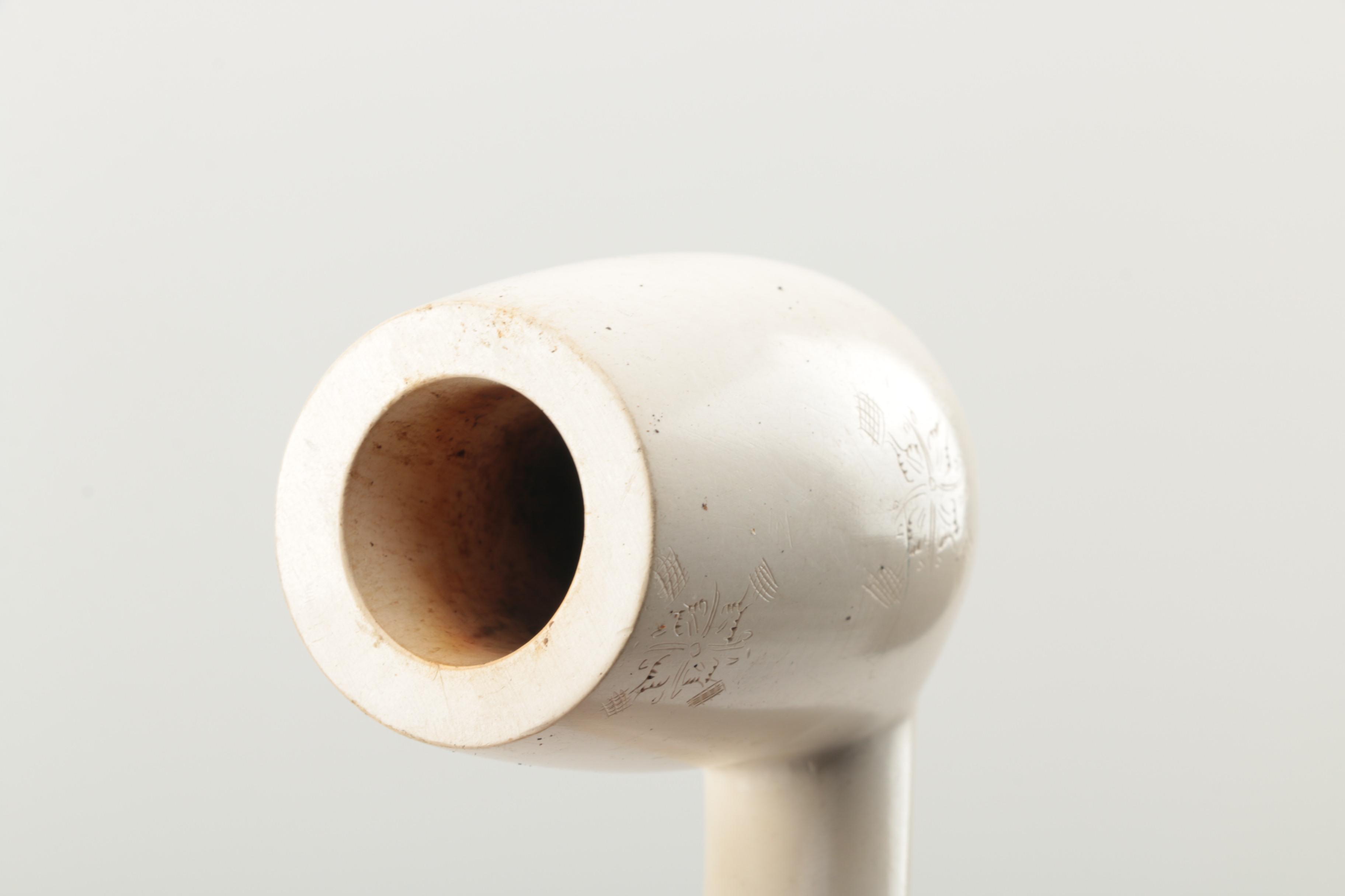 Assortment of Tobacco Pipes