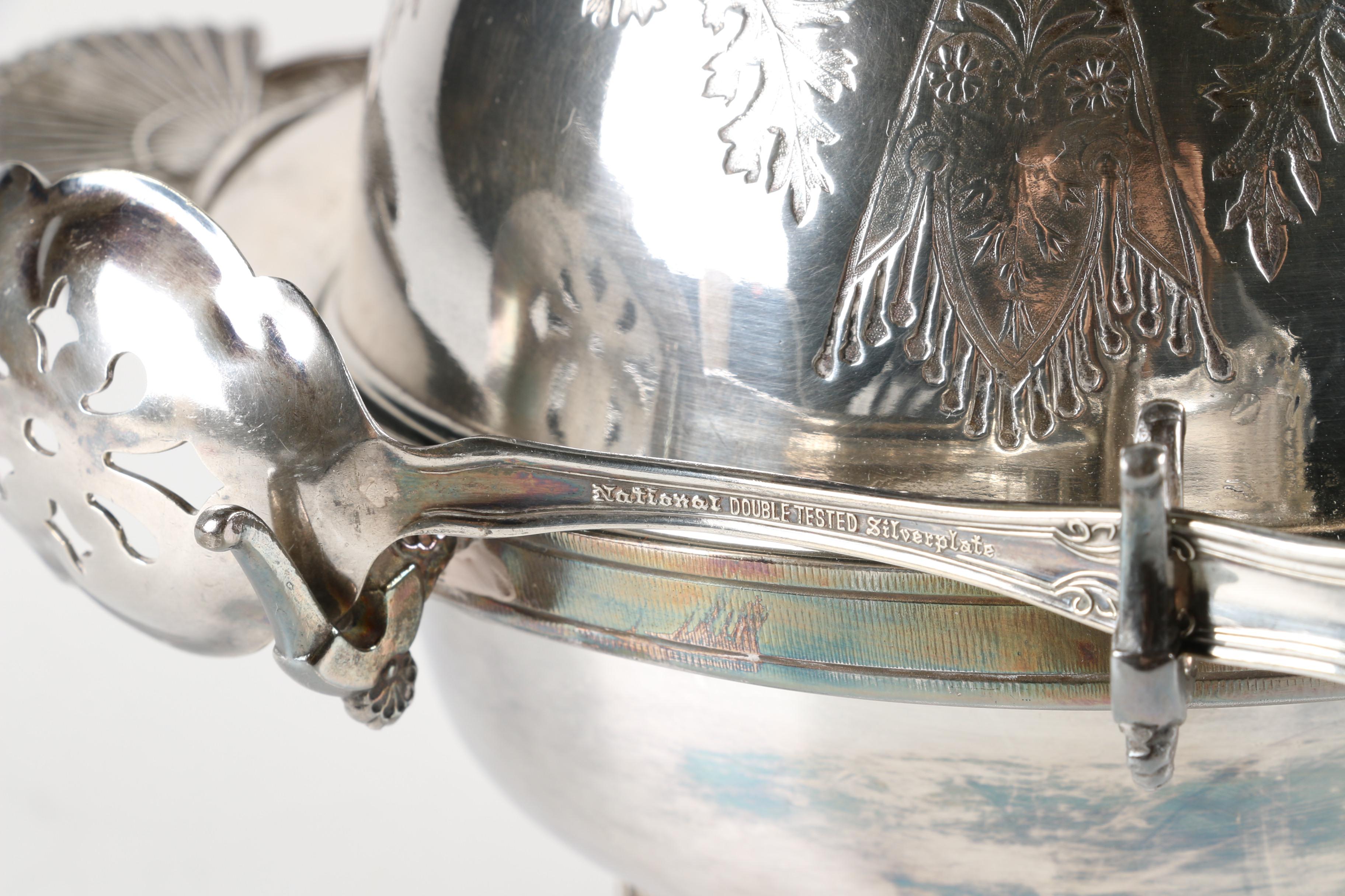 The Acme Silver Co. Silver Plate Butter Dish with a National Silver Co. Spoon