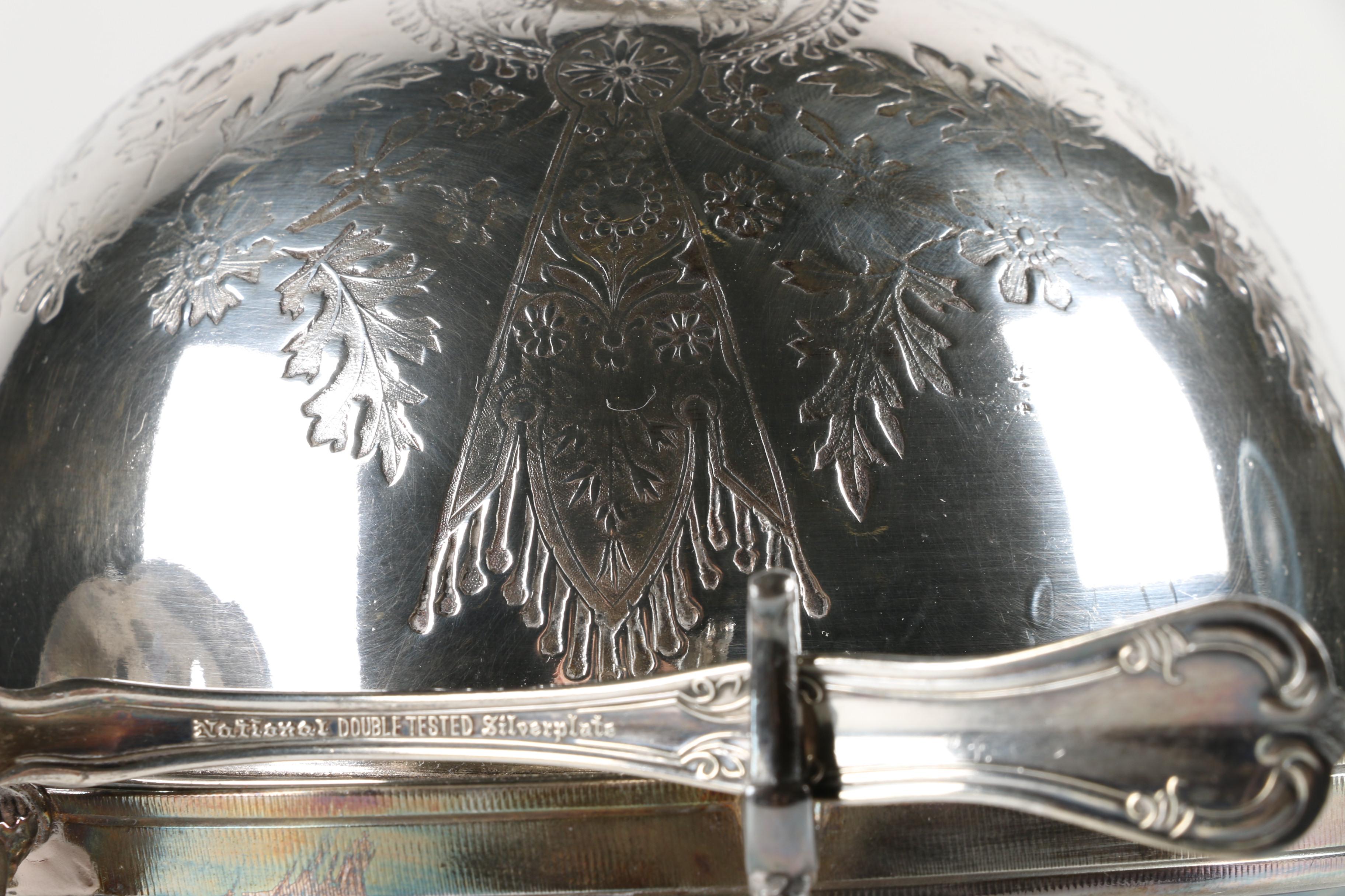 The Acme Silver Co. Silver Plate Butter Dish with a National Silver Co. Spoon