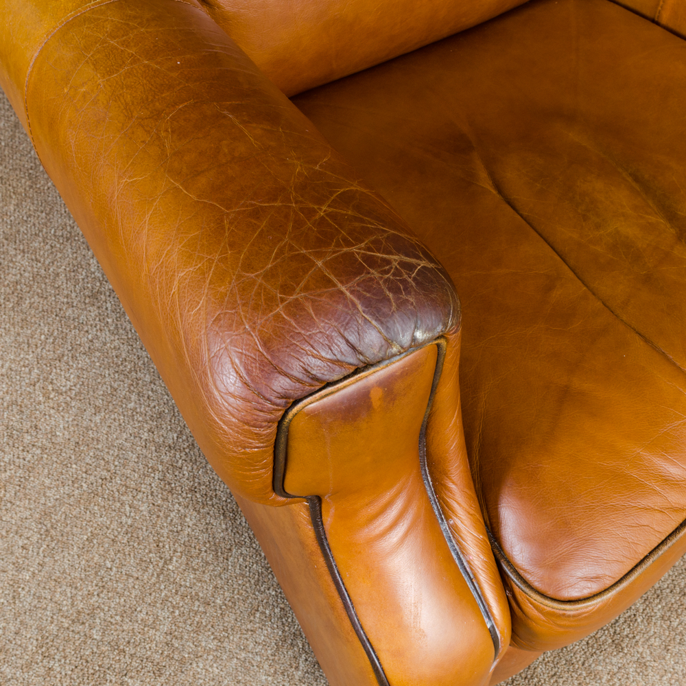Bassett Furniture Leather Armchair and Ottoman