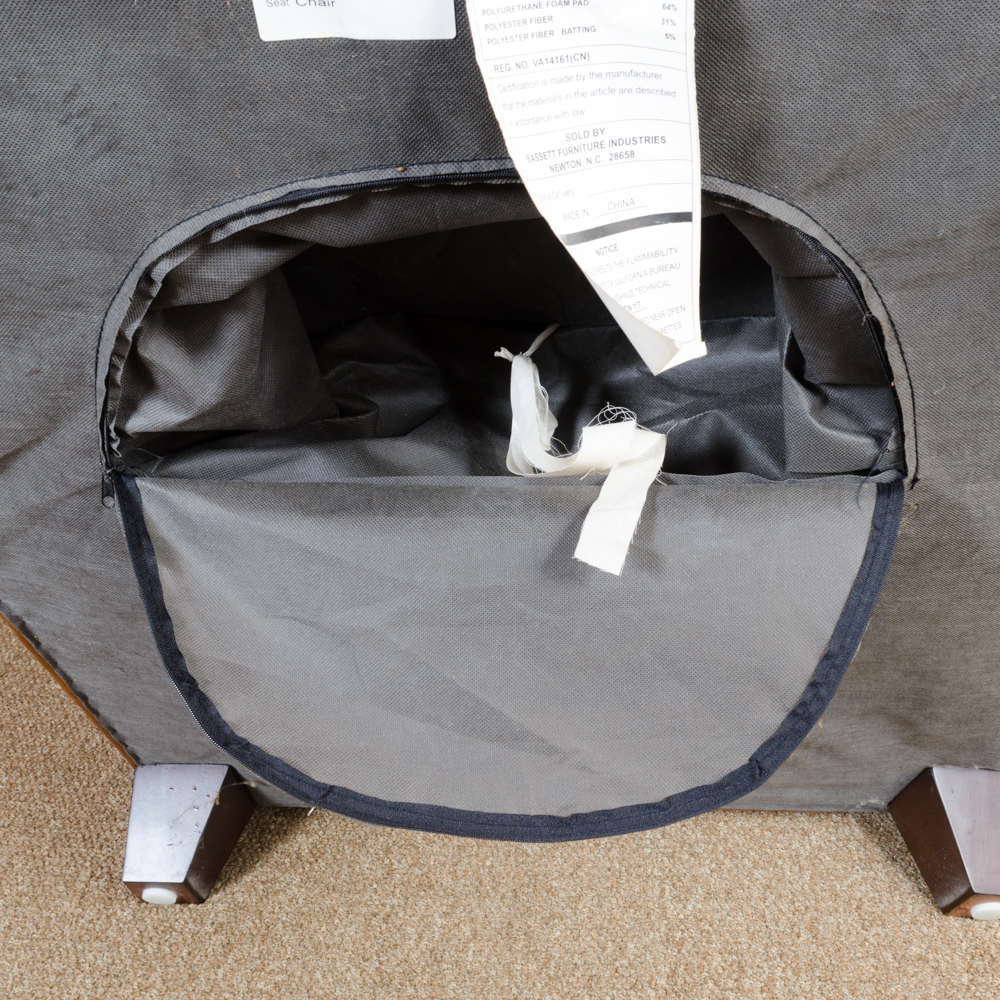 Bassett Furniture Leather Armchair and Ottoman