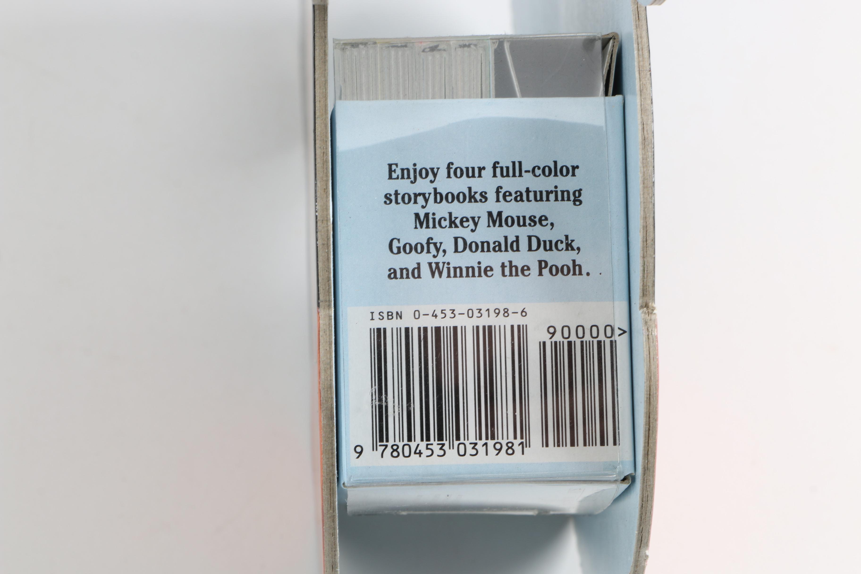 Assortment of Disney Books and Merchandise