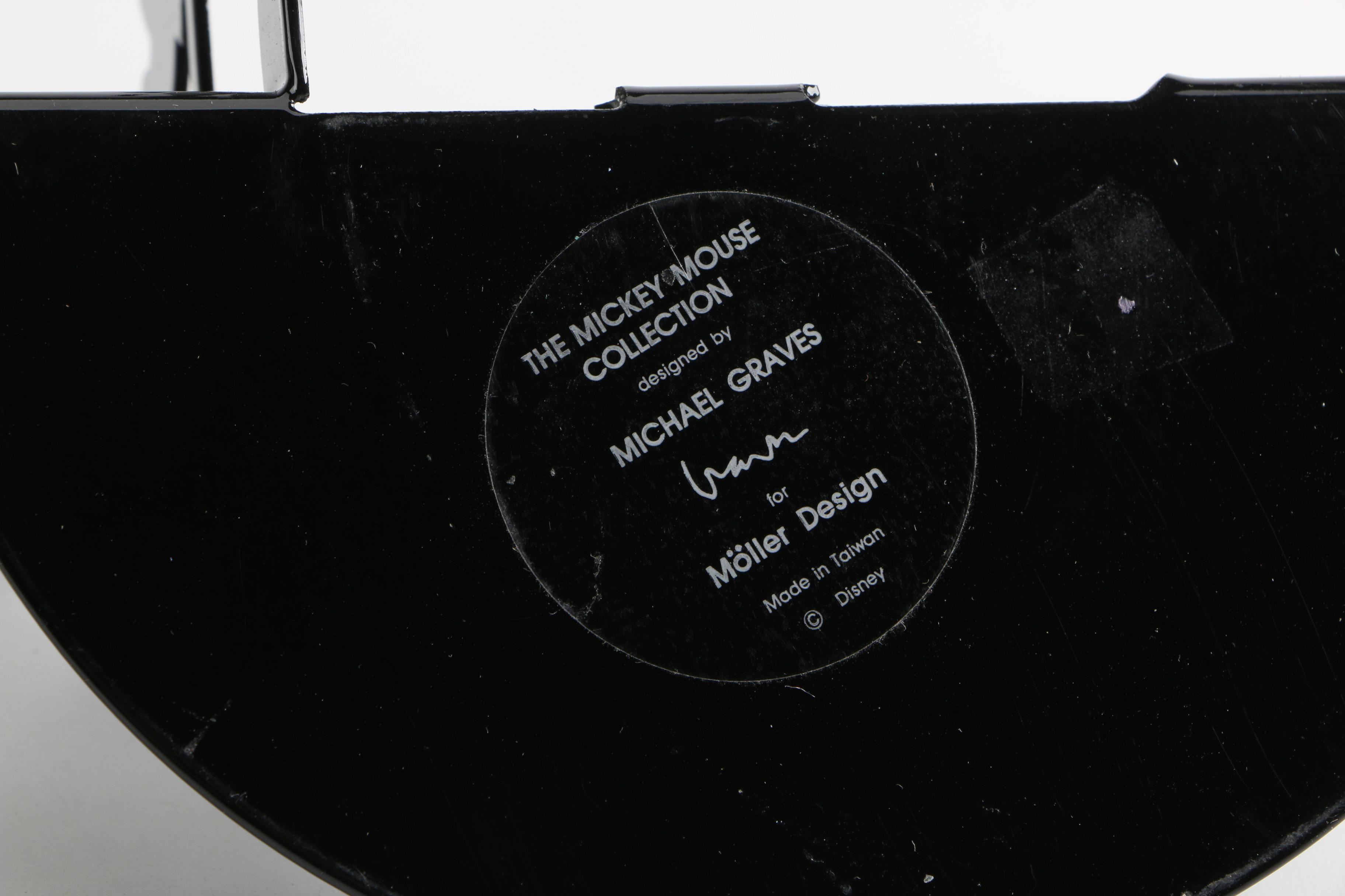 Assortment of Disney Books and Merchandise