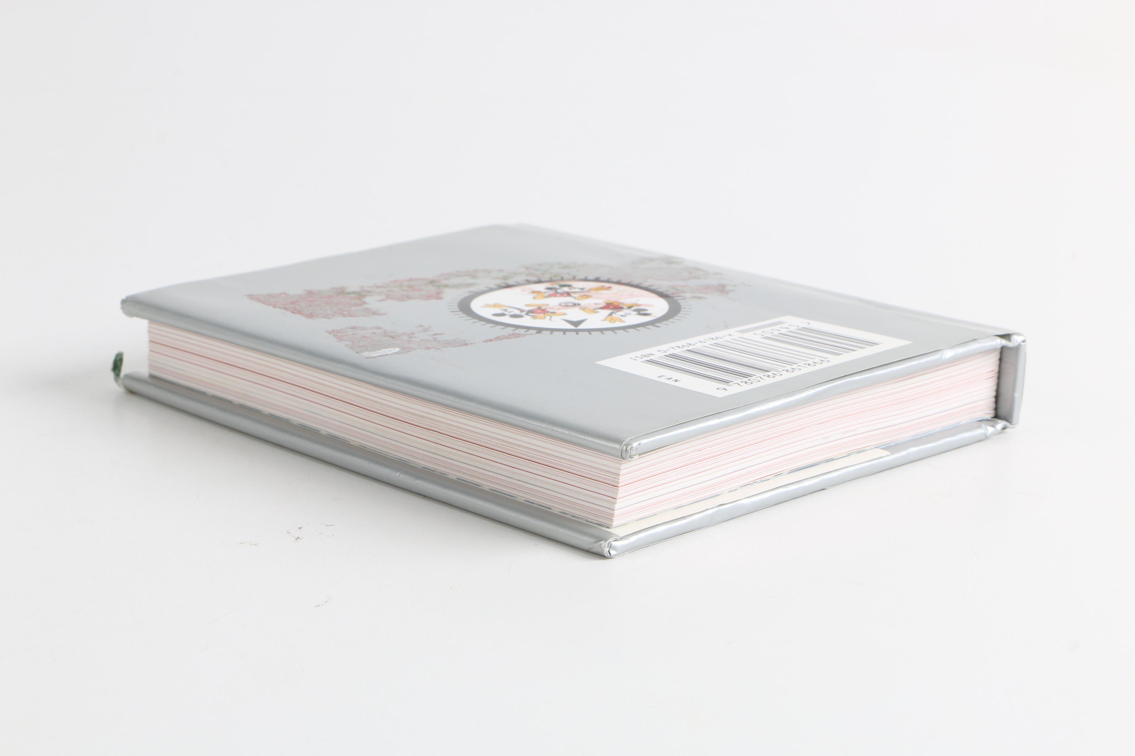 Assortment of Disney Books and Merchandise