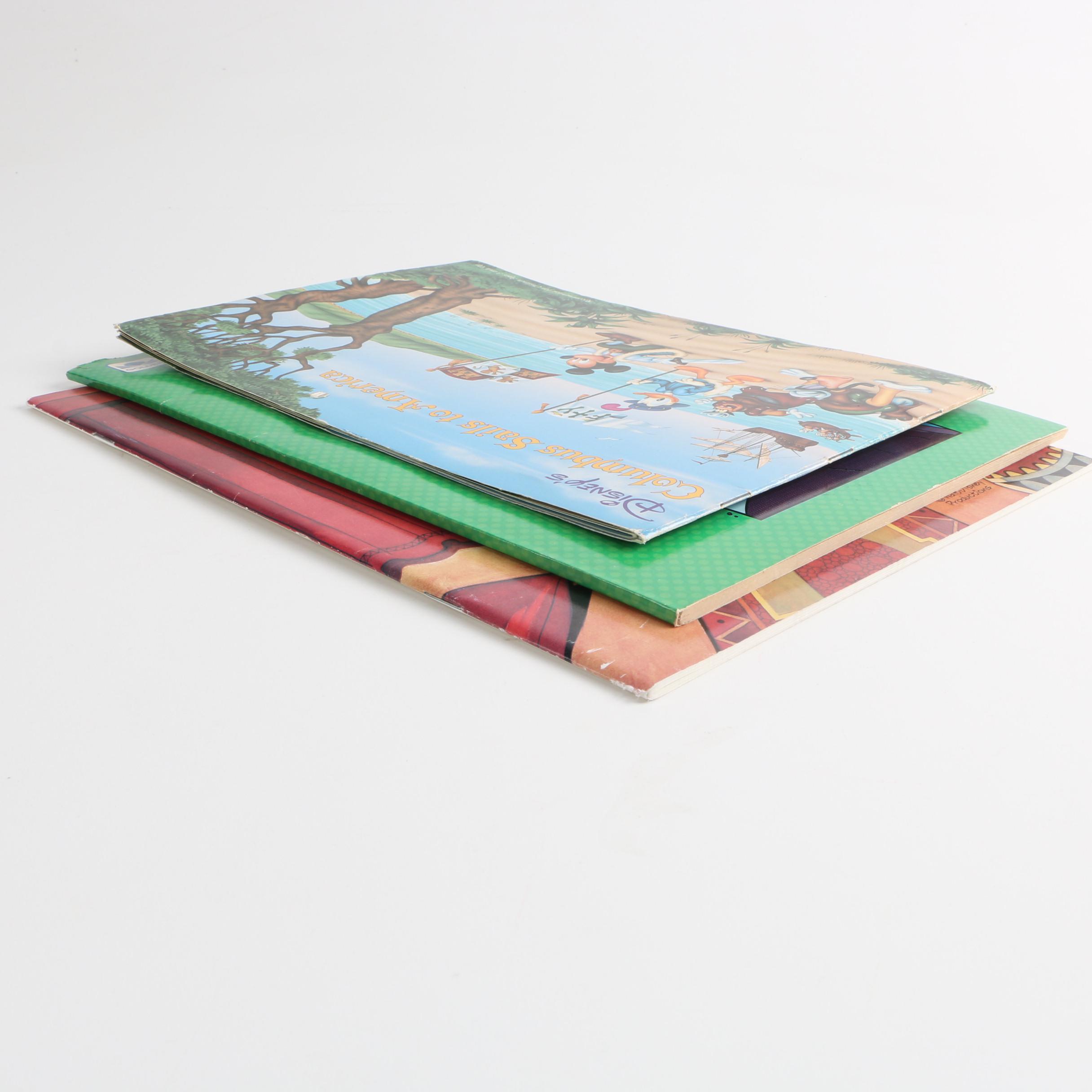 Assortment of Disney Books and Merchandise