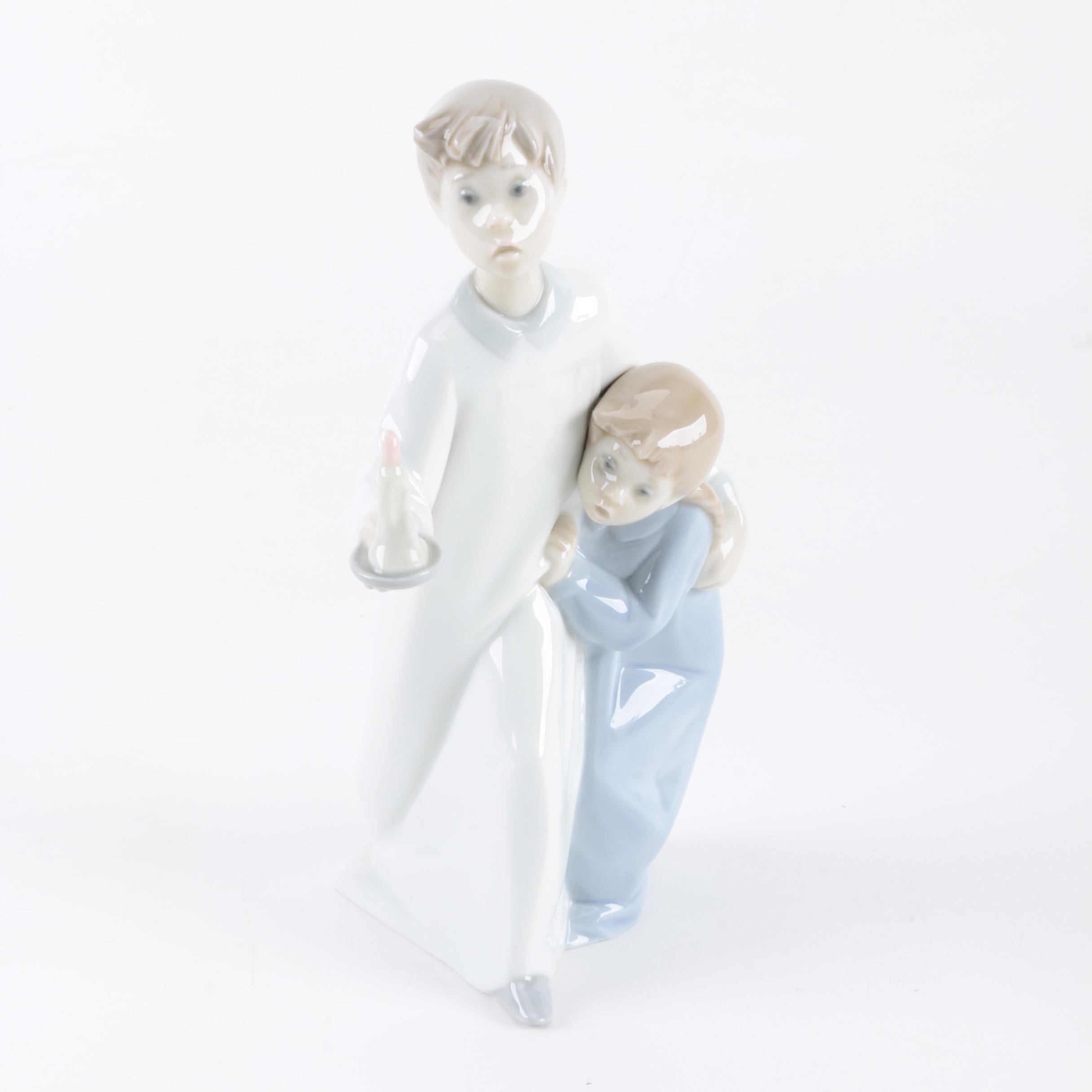 Lladro "Boy in Nightshirt" Figurine