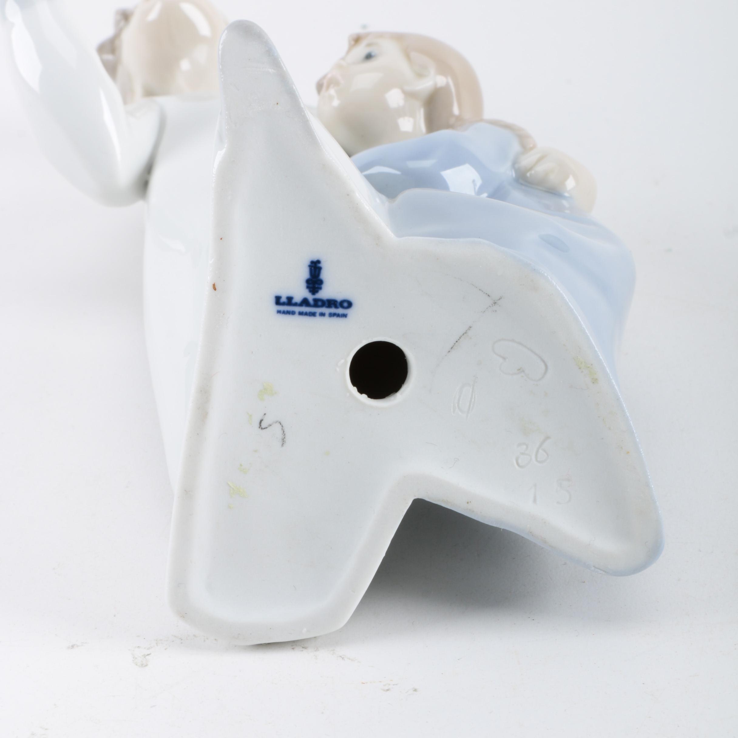 Lladro "Boy in Nightshirt" Figurine