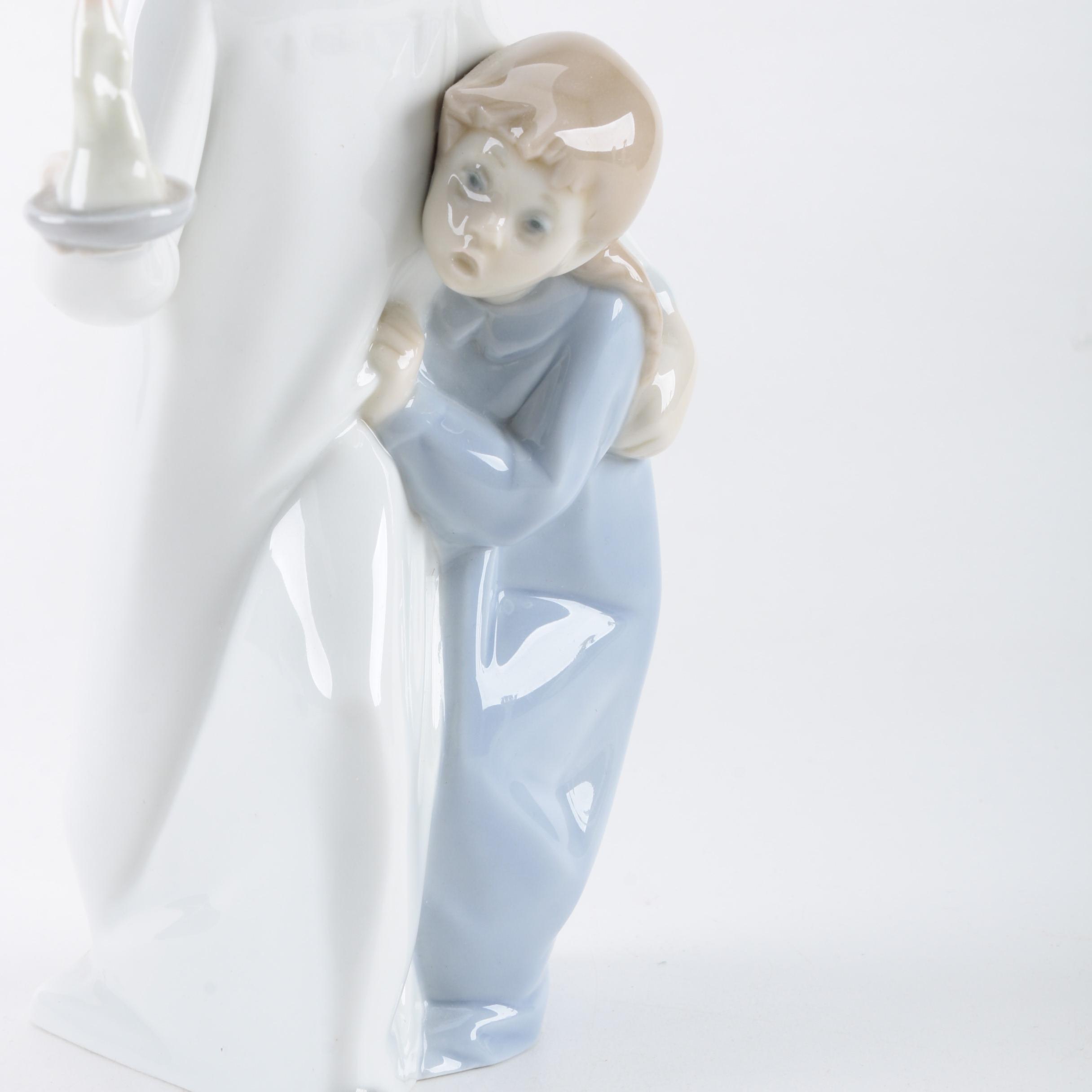 Lladro "Boy in Nightshirt" Figurine