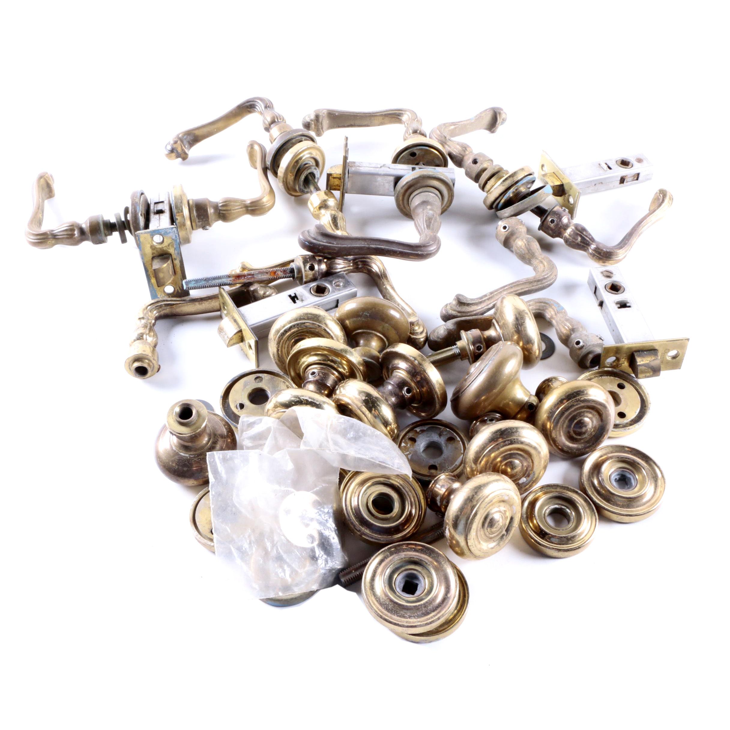 An Assortment of Door Knobs, Handles, and Mechanisms