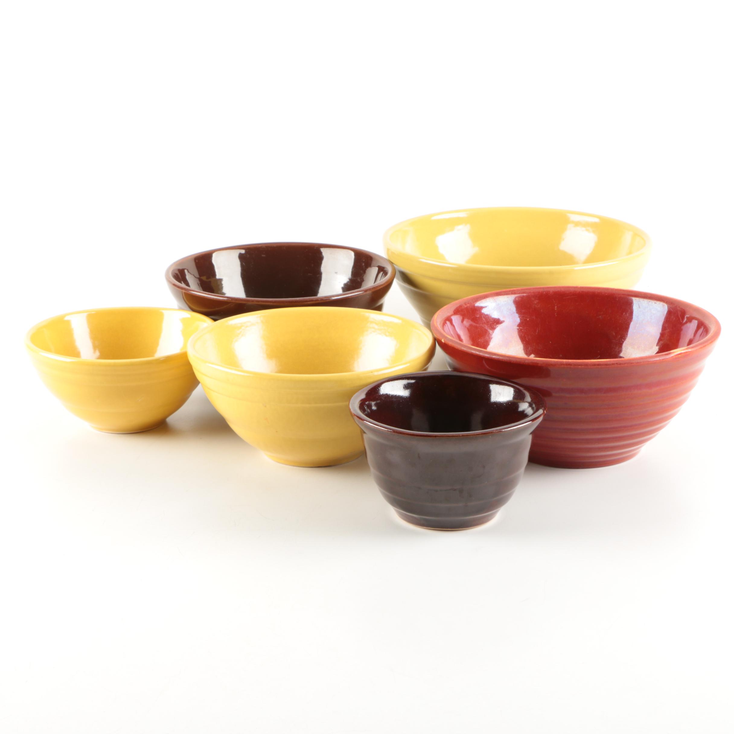Collection of Vintage Pottery Mixing Bowls Featuring Monmouth Pottery