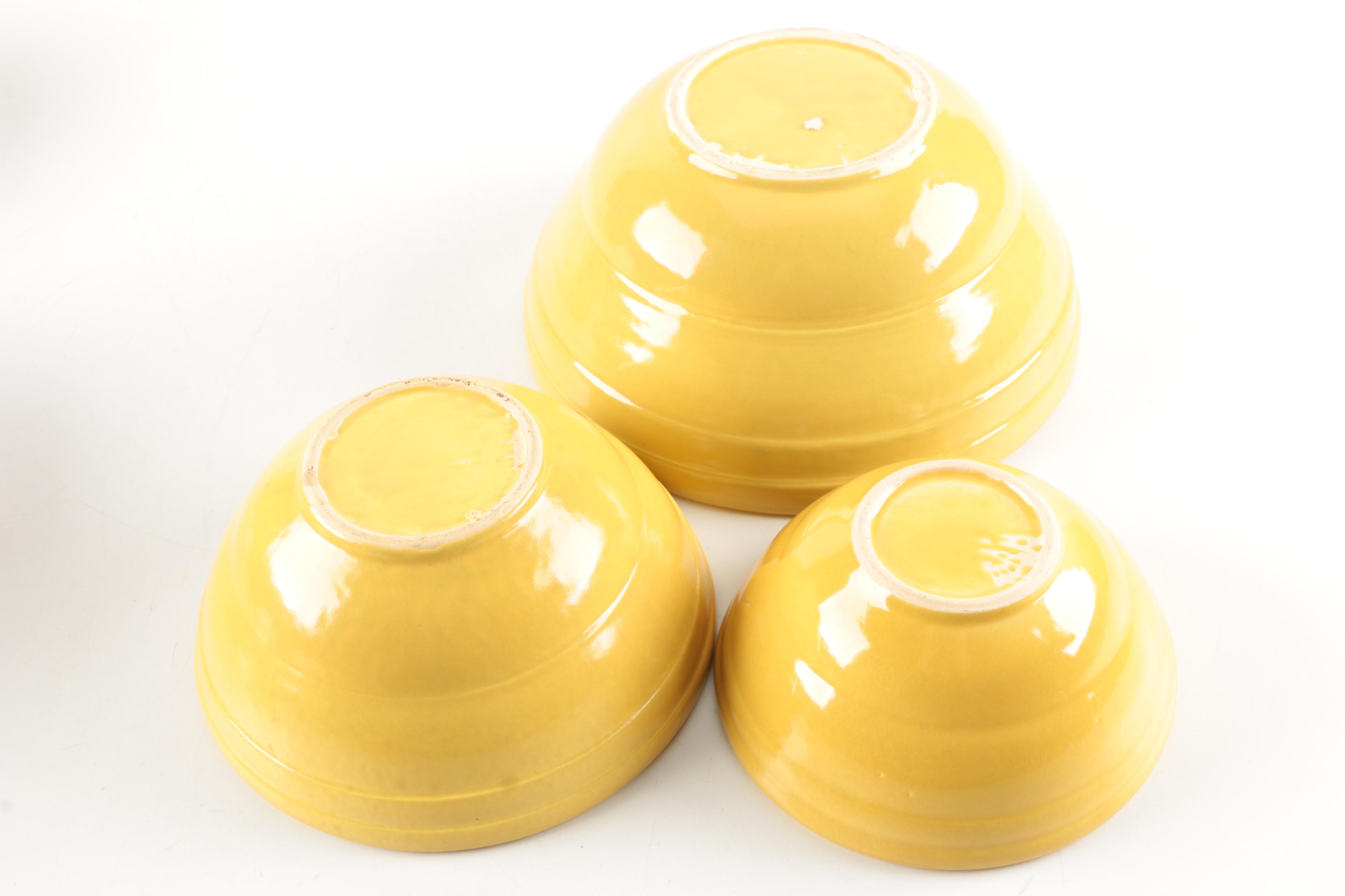 Collection of Vintage Pottery Mixing Bowls Featuring Monmouth Pottery