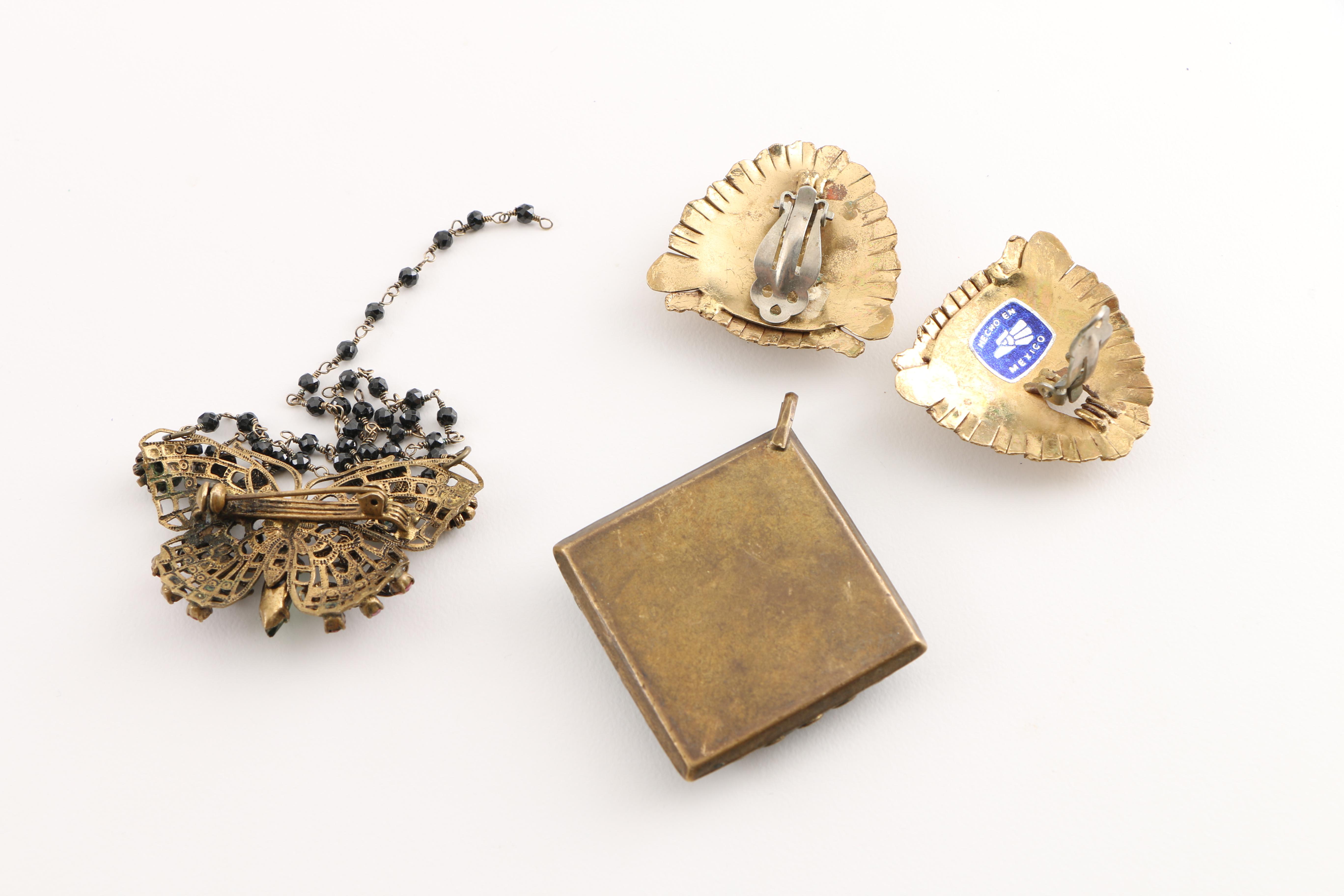 Assortment of Costume Jewelry Featuring ST. JOHN Charm Bracelet