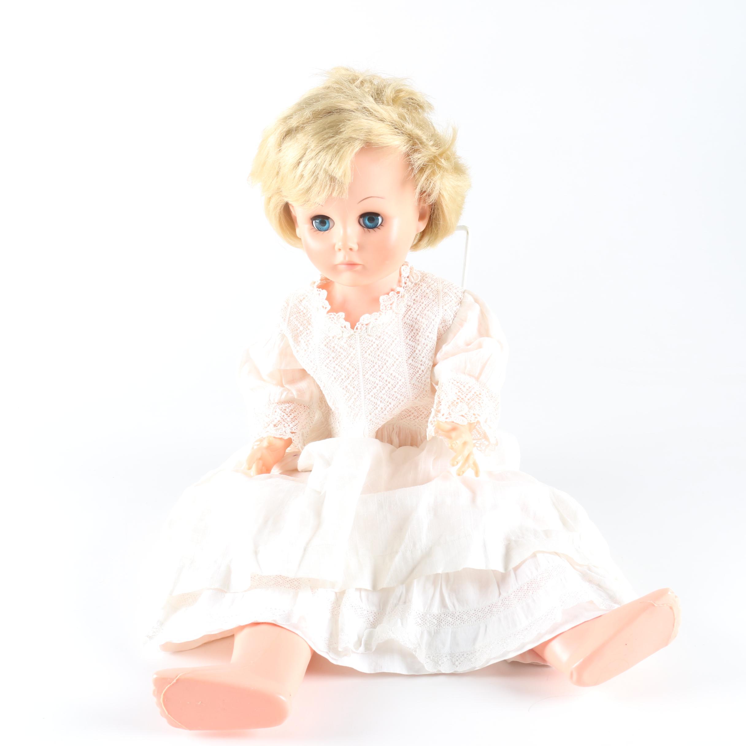 Circa 1960s Blonde Doll in White Dress