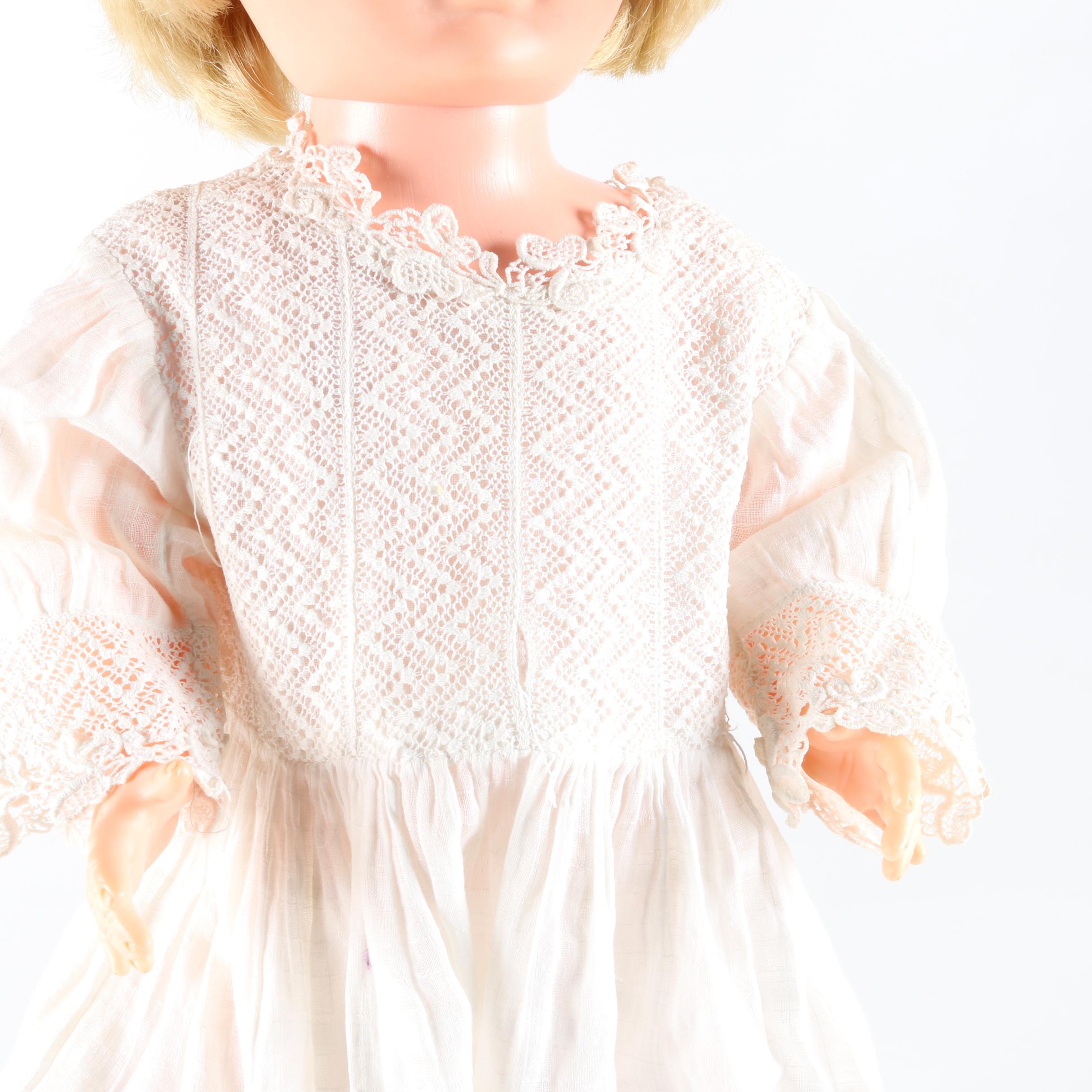 Circa 1960s Blonde Doll in White Dress