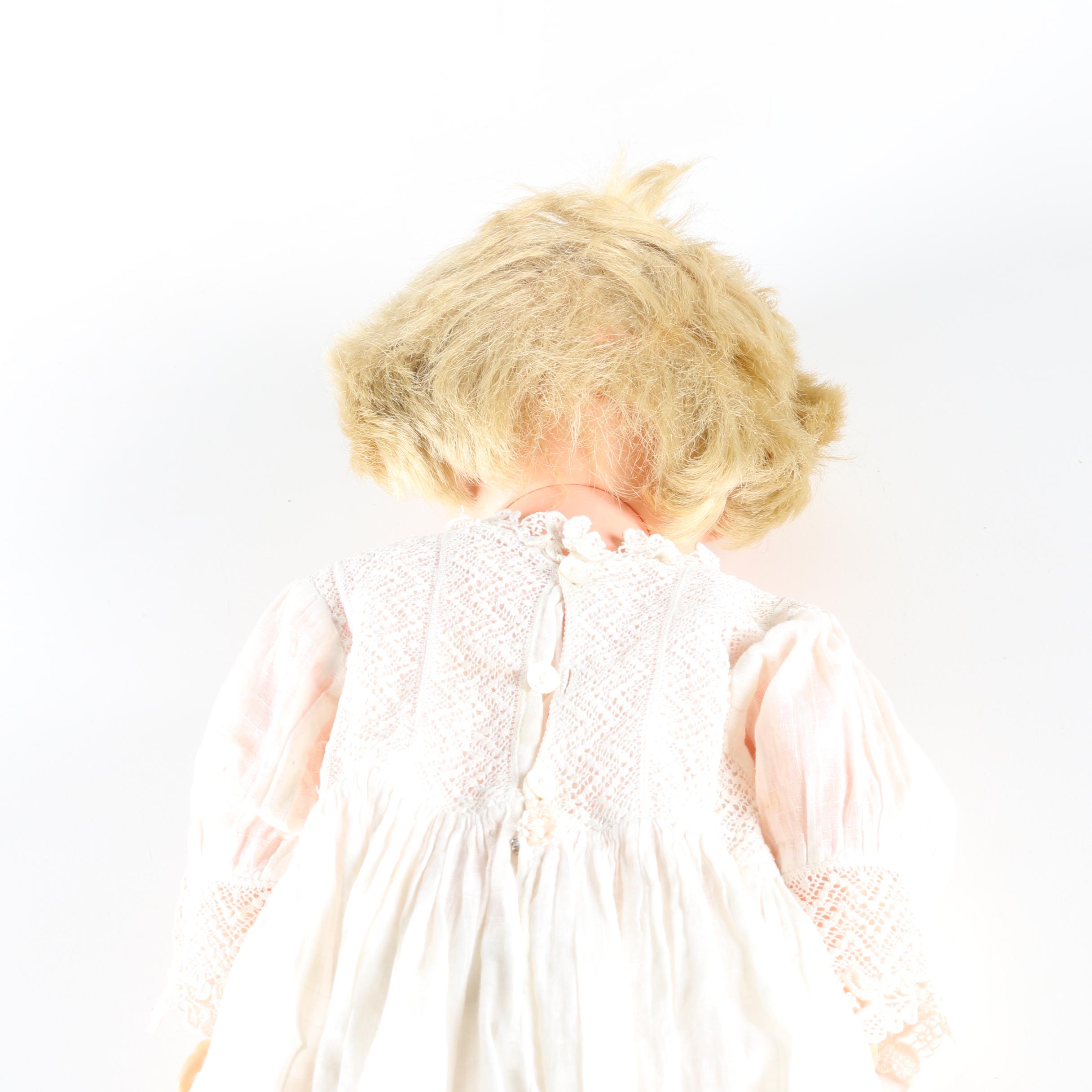 Circa 1960s Blonde Doll in White Dress