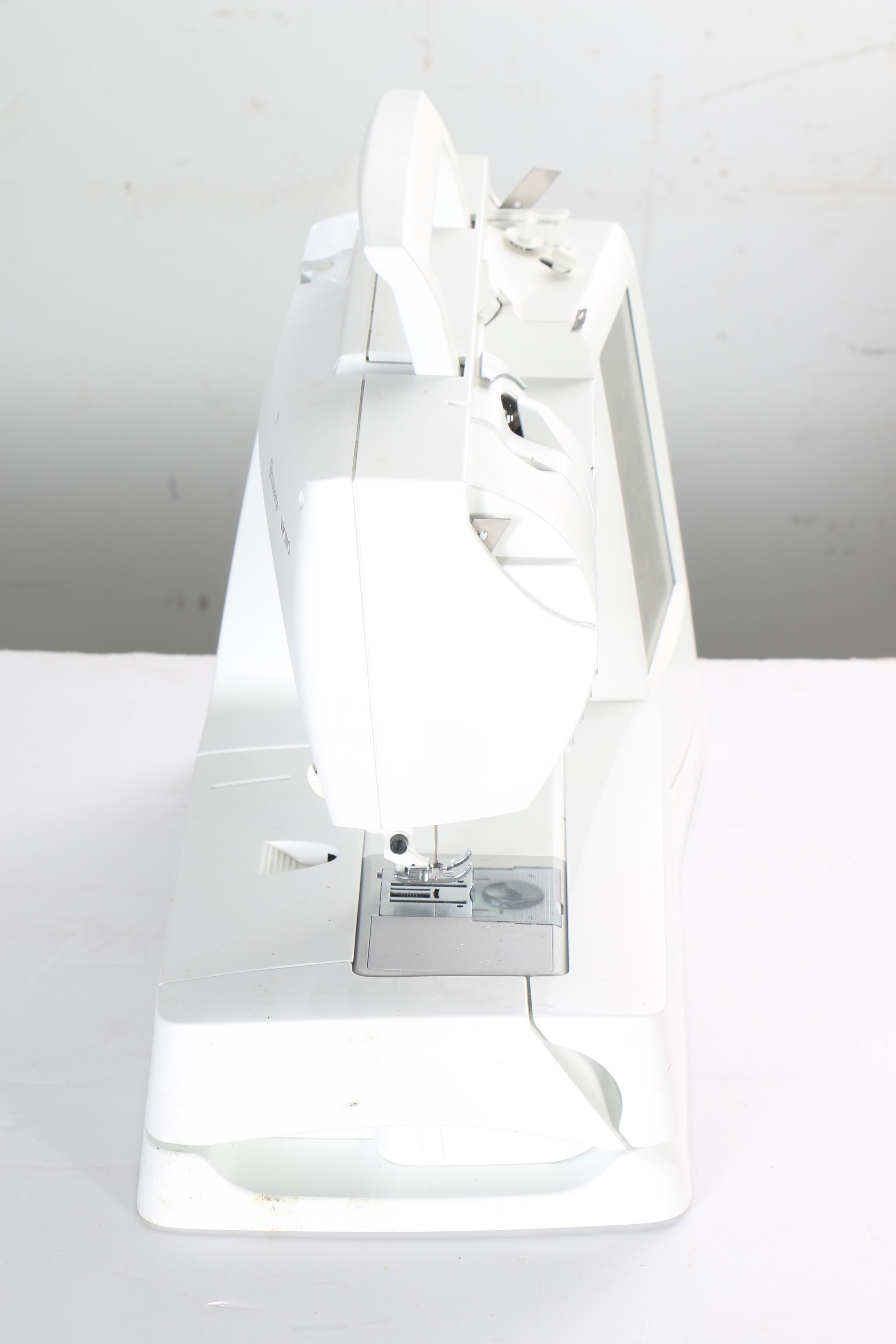 Husqvarna Viking SE Sewing Machine, Embroidery Arm and Supplies