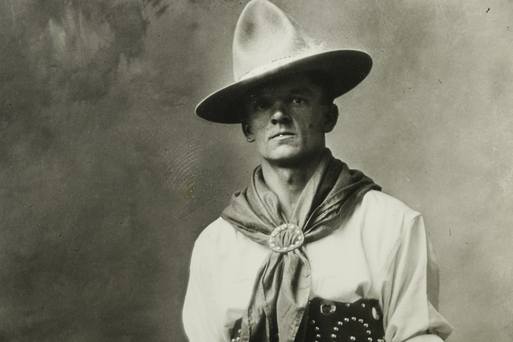 Photograph of Wild West Performer "Tex" Cooper and 101 Ranch Book