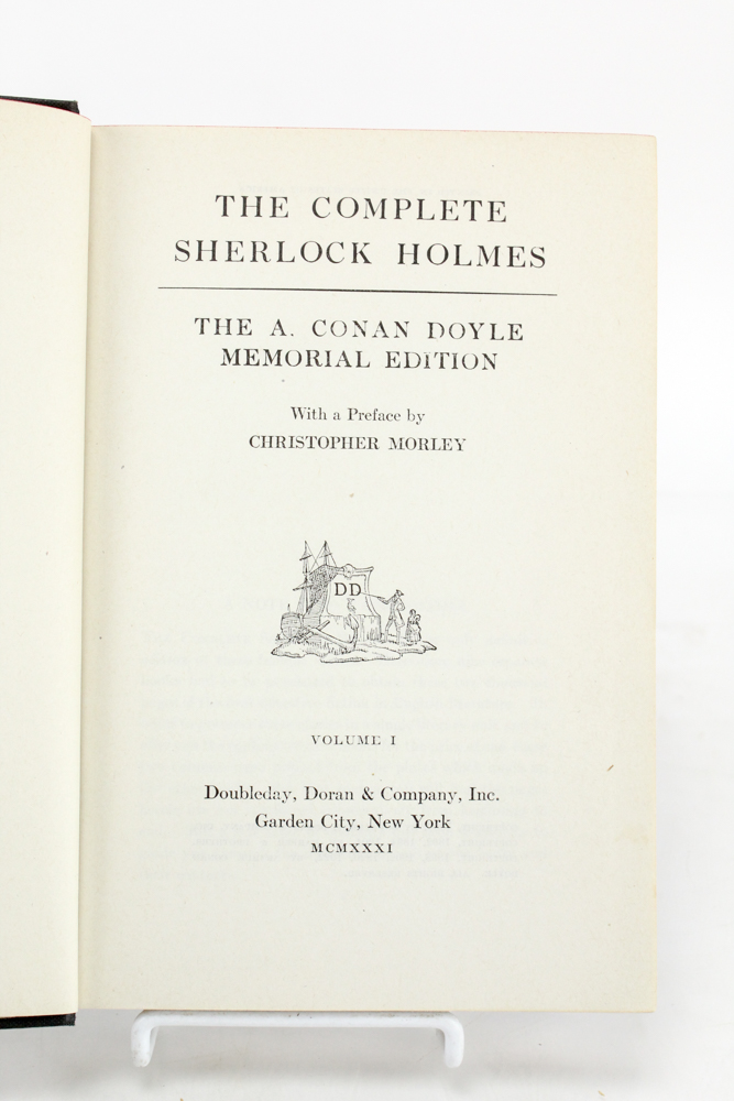 Assorted Antique and Vintage Hardcover Books featuring "Sherlock Holmes"