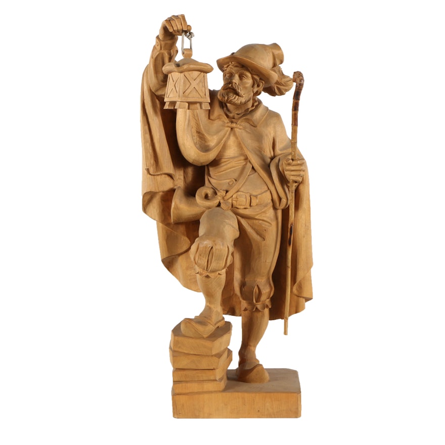 Wooden Sculpture of a Traveler