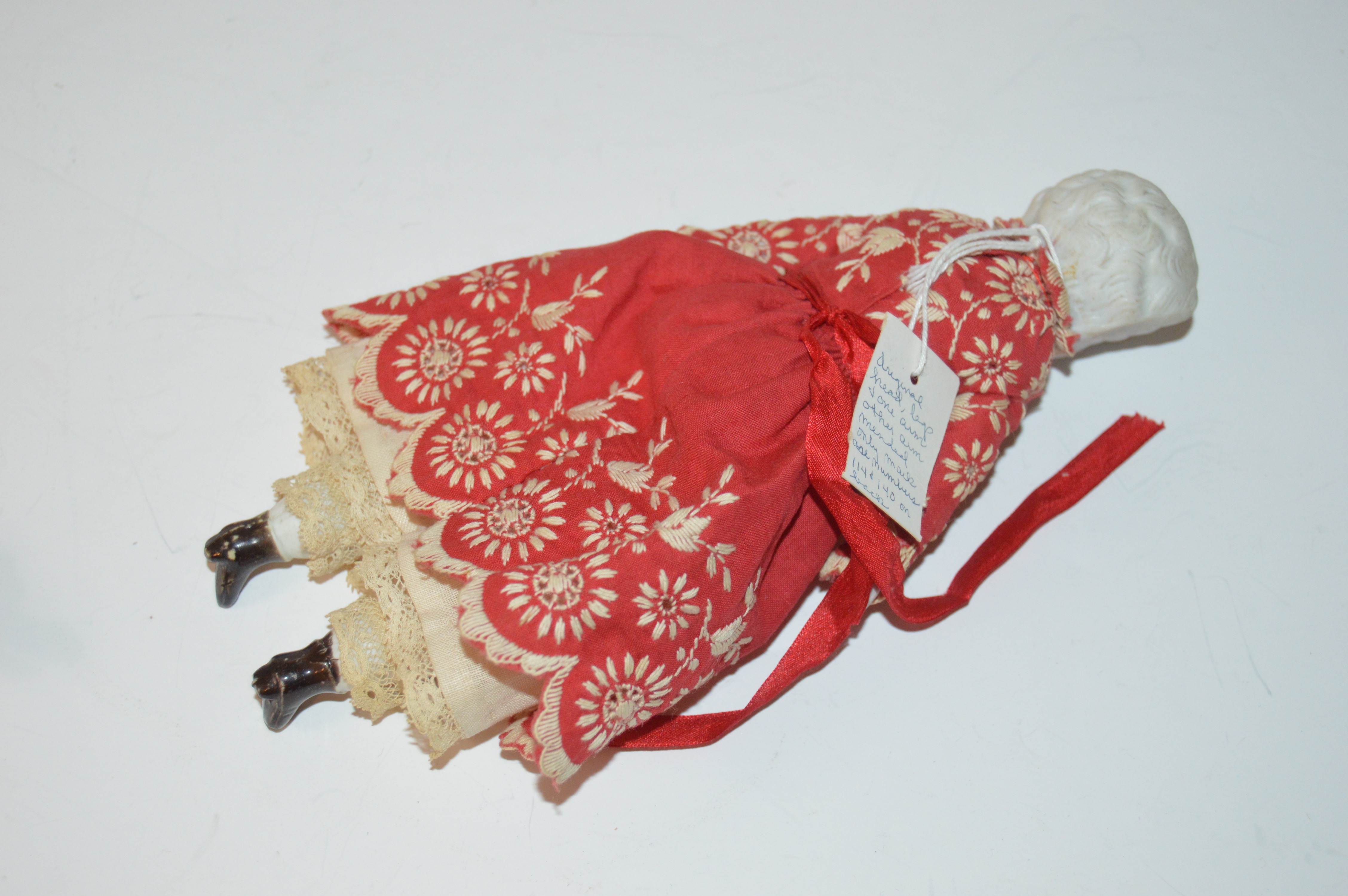 Schoenhut Ringmaster Doll and Female Bisque Doll