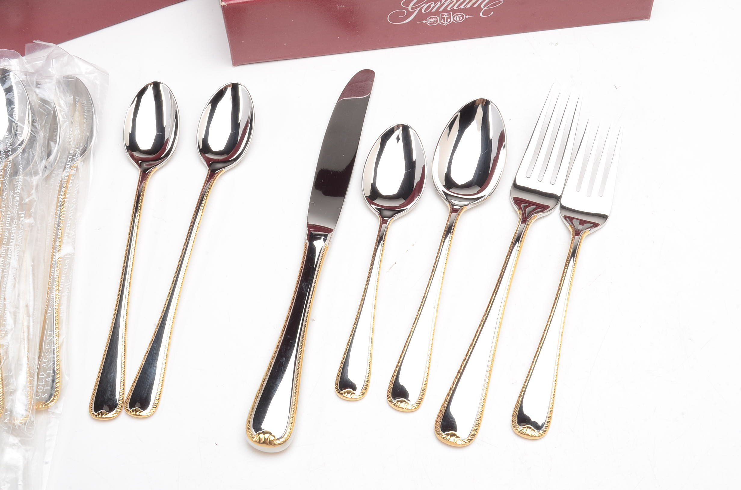 Contemporary Gorham Stainless Flatware with Gold Accent Edge