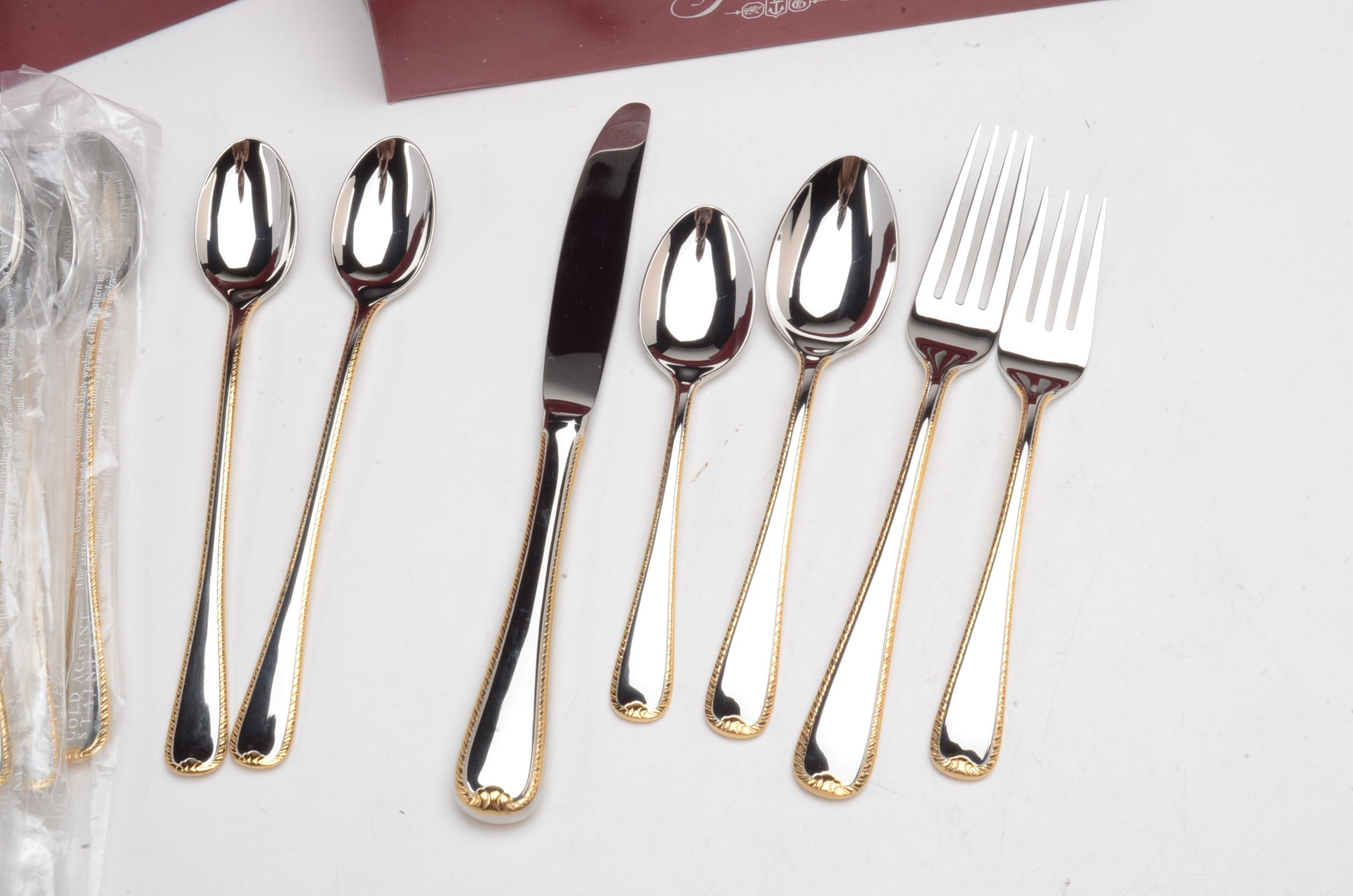 Contemporary Gorham Stainless Flatware with Gold Accent Edge