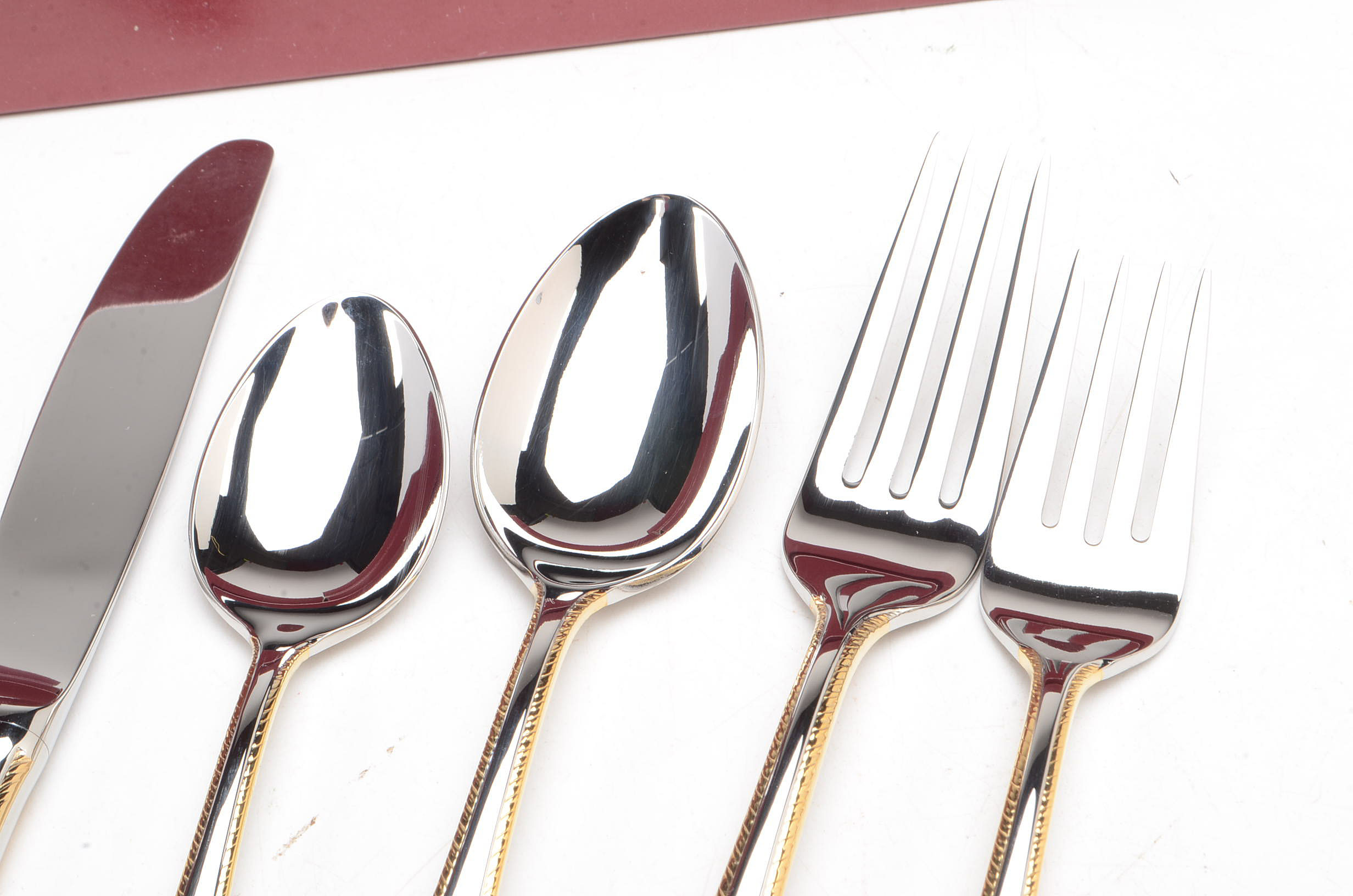 Contemporary Gorham Stainless Flatware with Gold Accent Edge