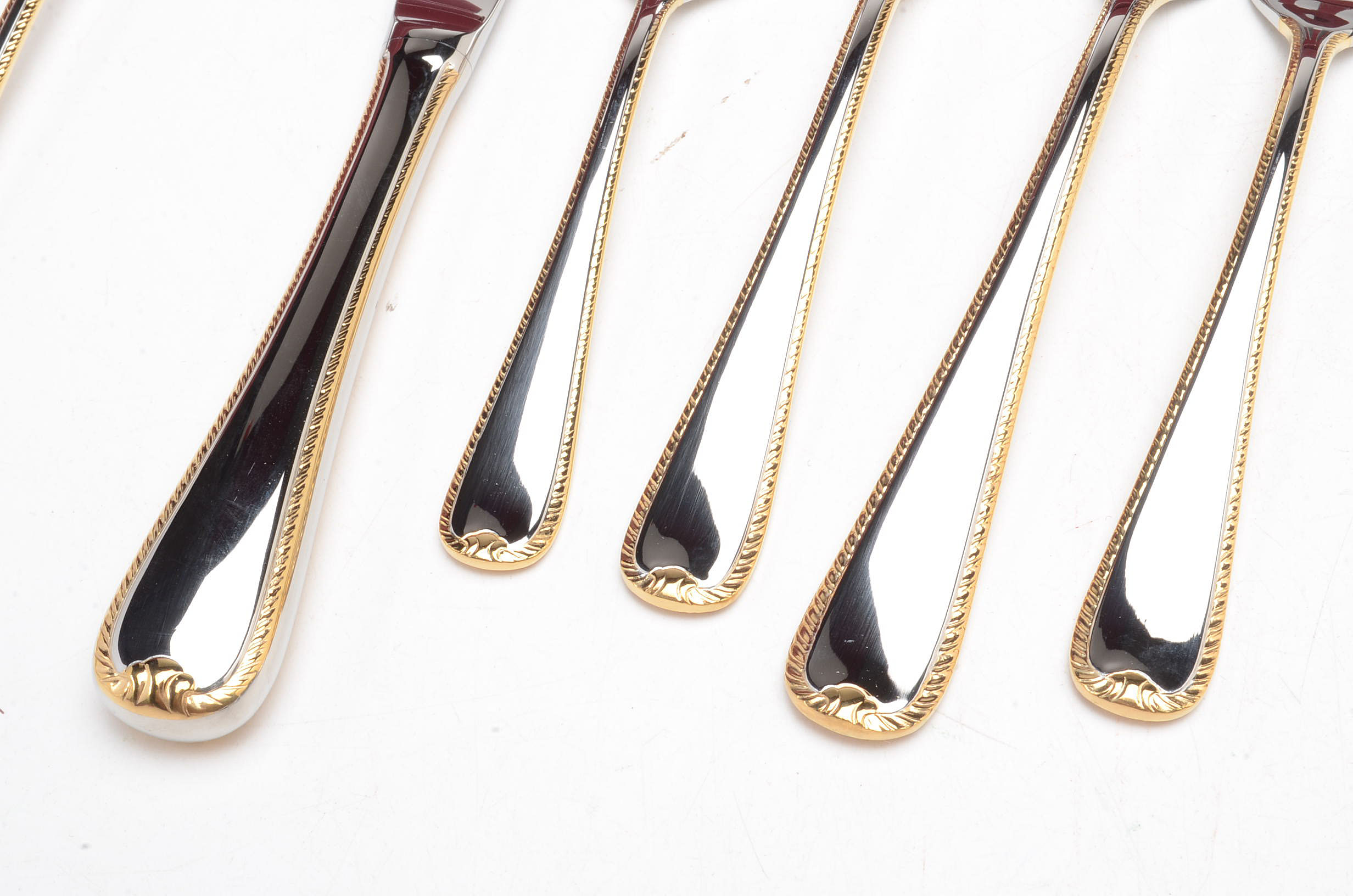 Contemporary Gorham Stainless Flatware with Gold Accent Edge