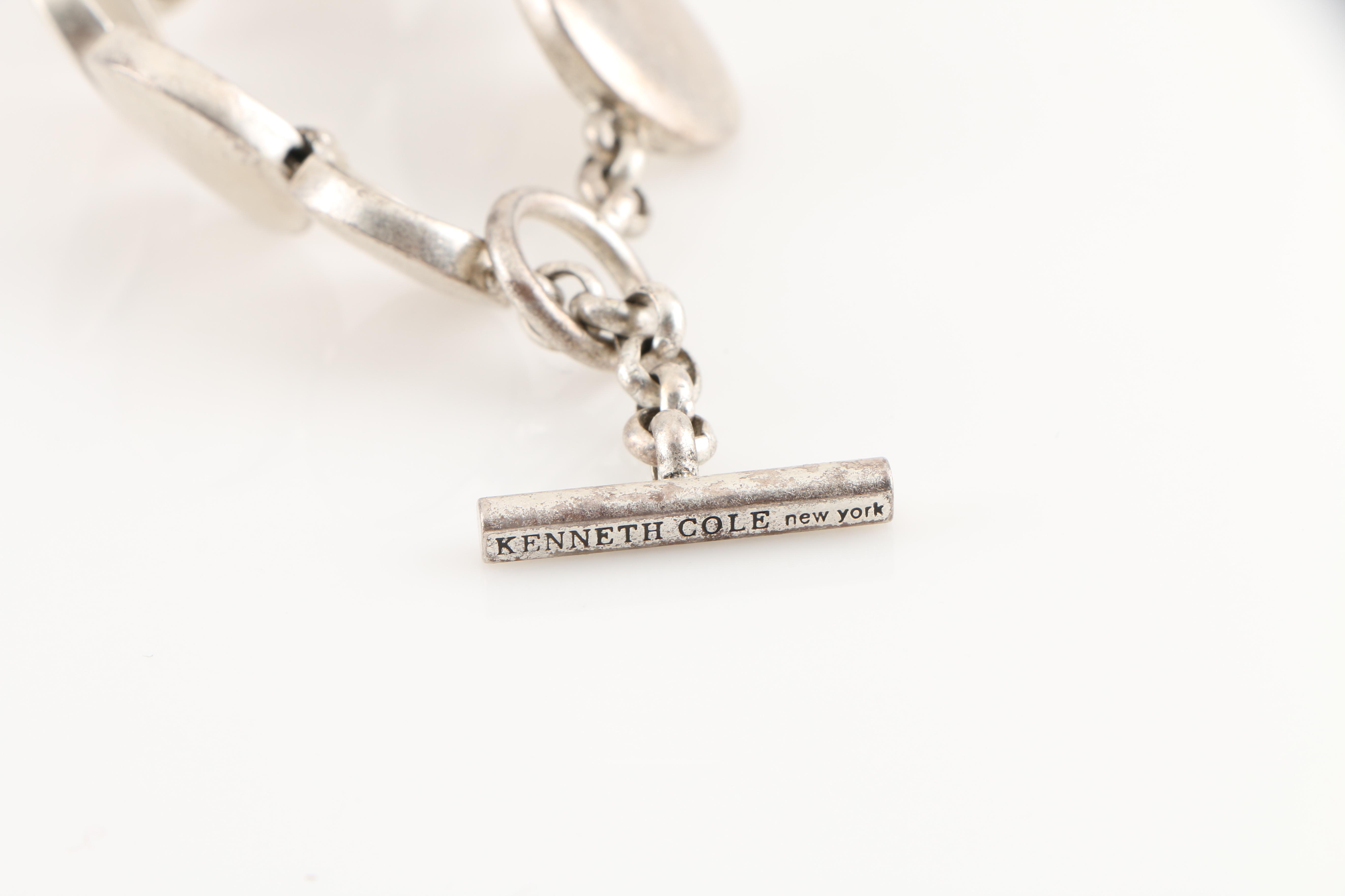 Assortment of Silver and Gold Tone Jewelry Including Swarovski Crystal Ring