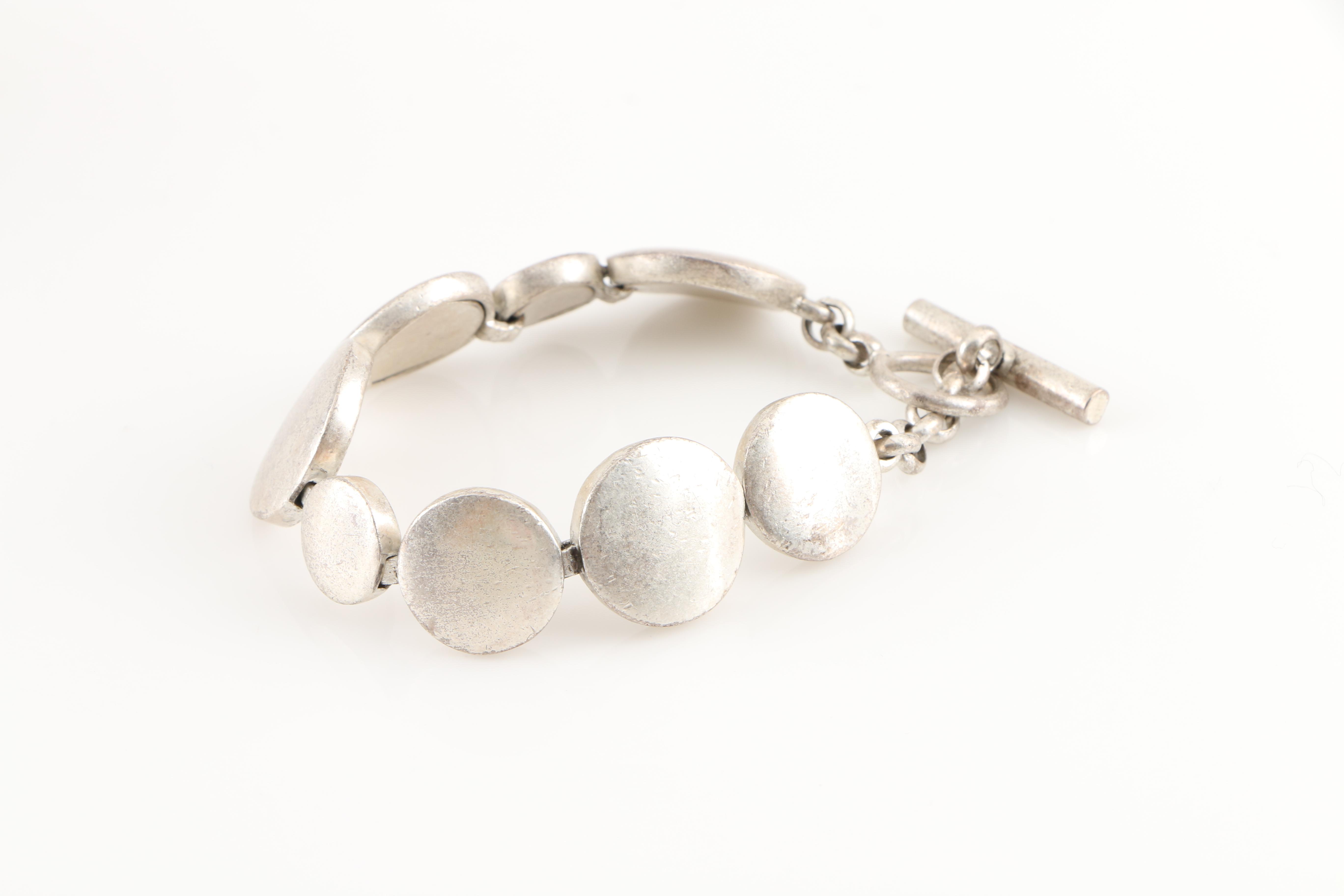 Assortment of Silver and Gold Tone Jewelry Including Swarovski Crystal Ring