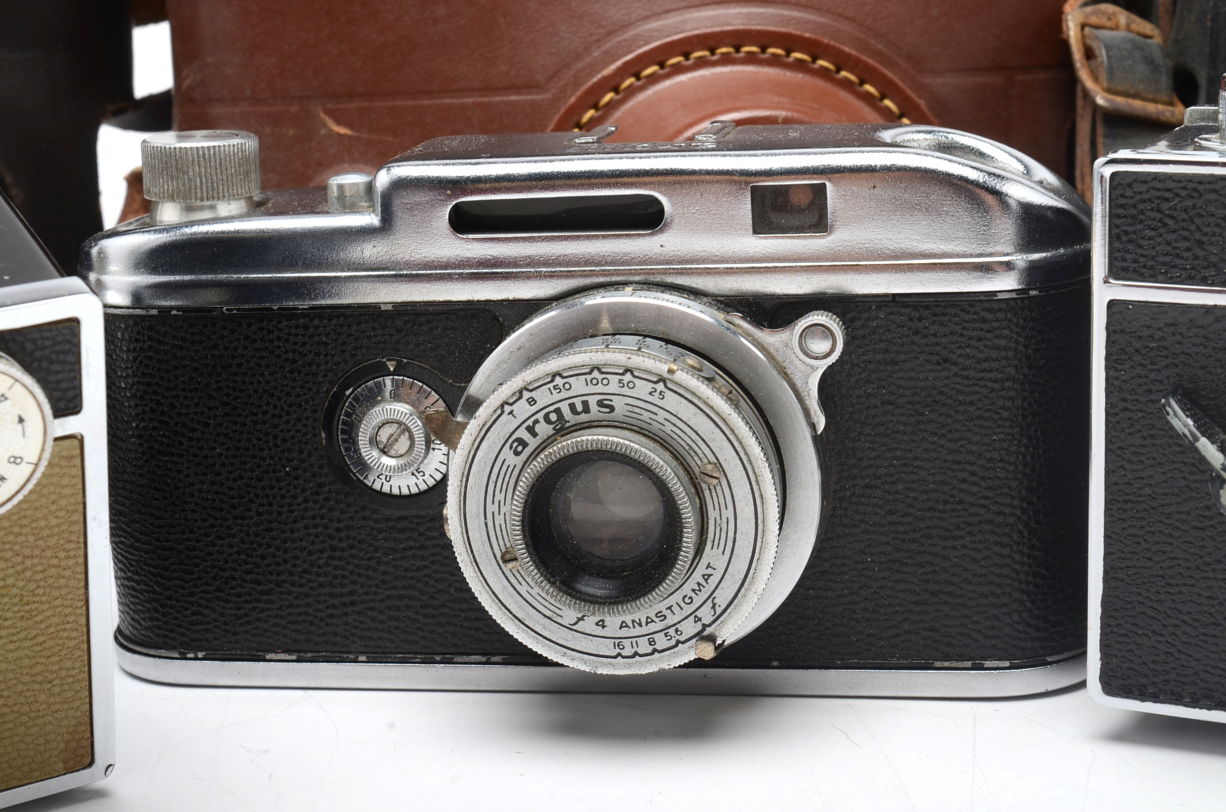 Nine Vintage Argus Cameras