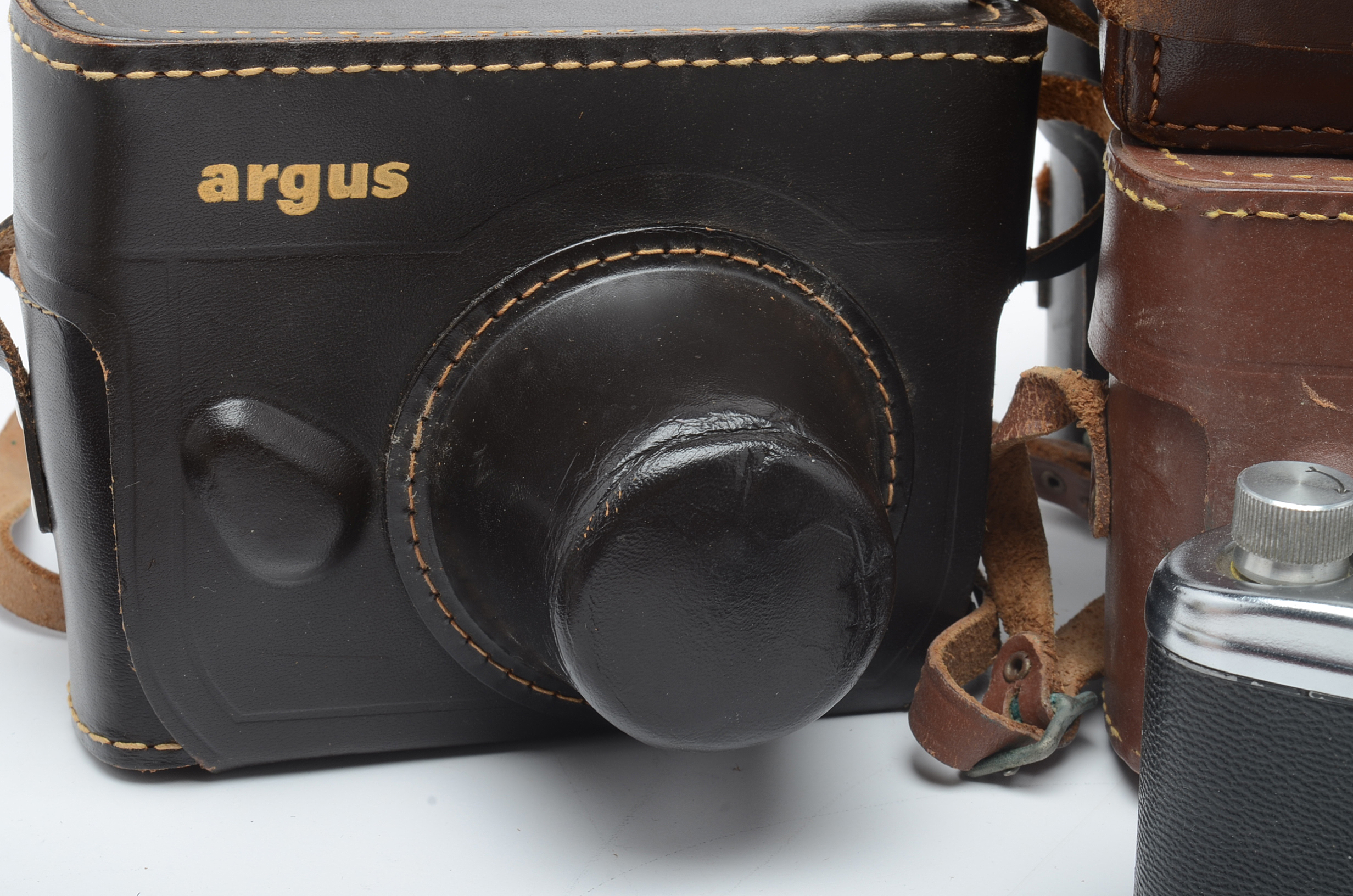 Nine Vintage Argus Cameras