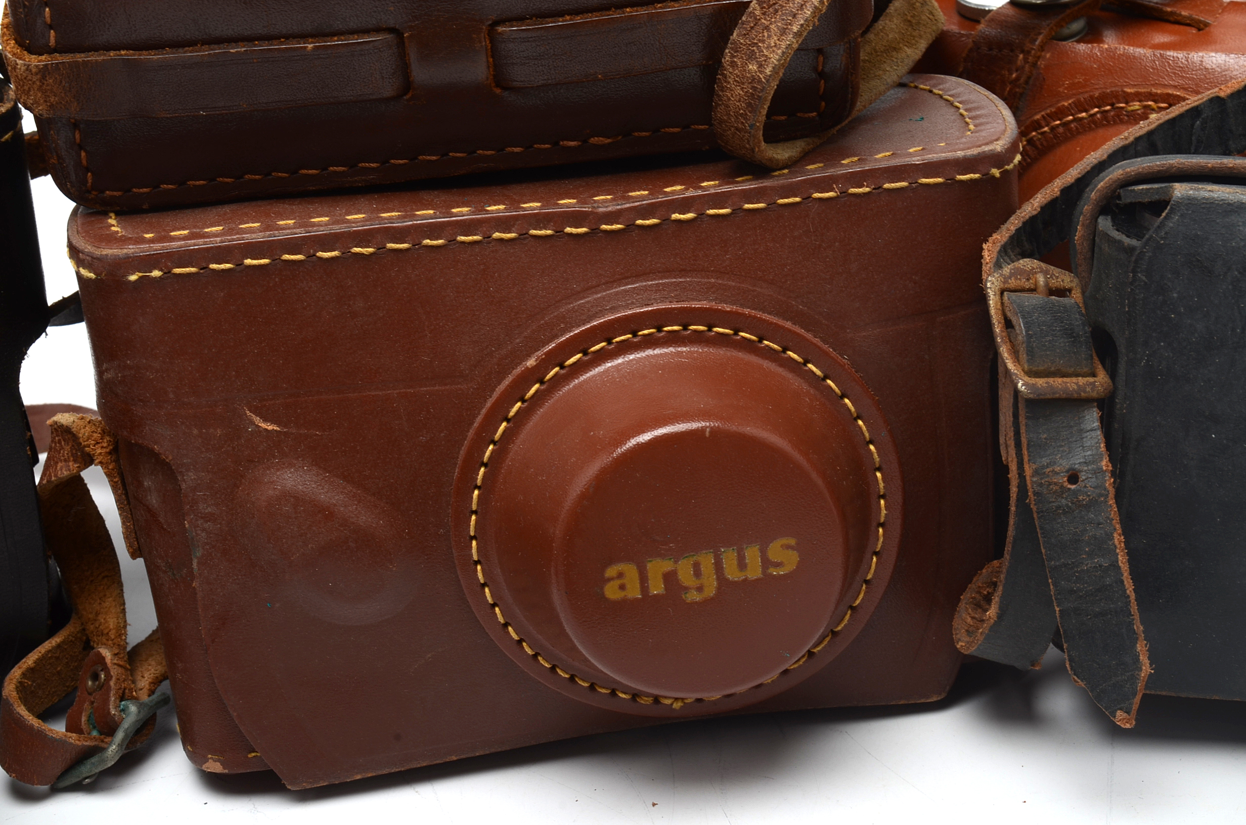 Nine Vintage Argus Cameras
