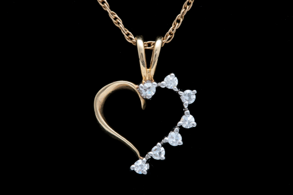 A 14K Two-Tone Gold and Diamond Heart Pendant with Chain