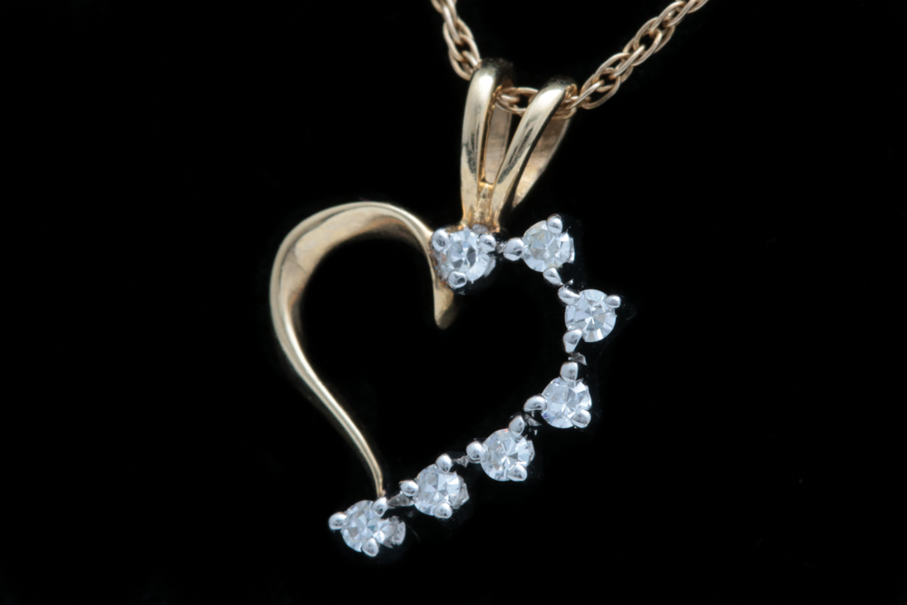 A 14K Two-Tone Gold and Diamond Heart Pendant with Chain