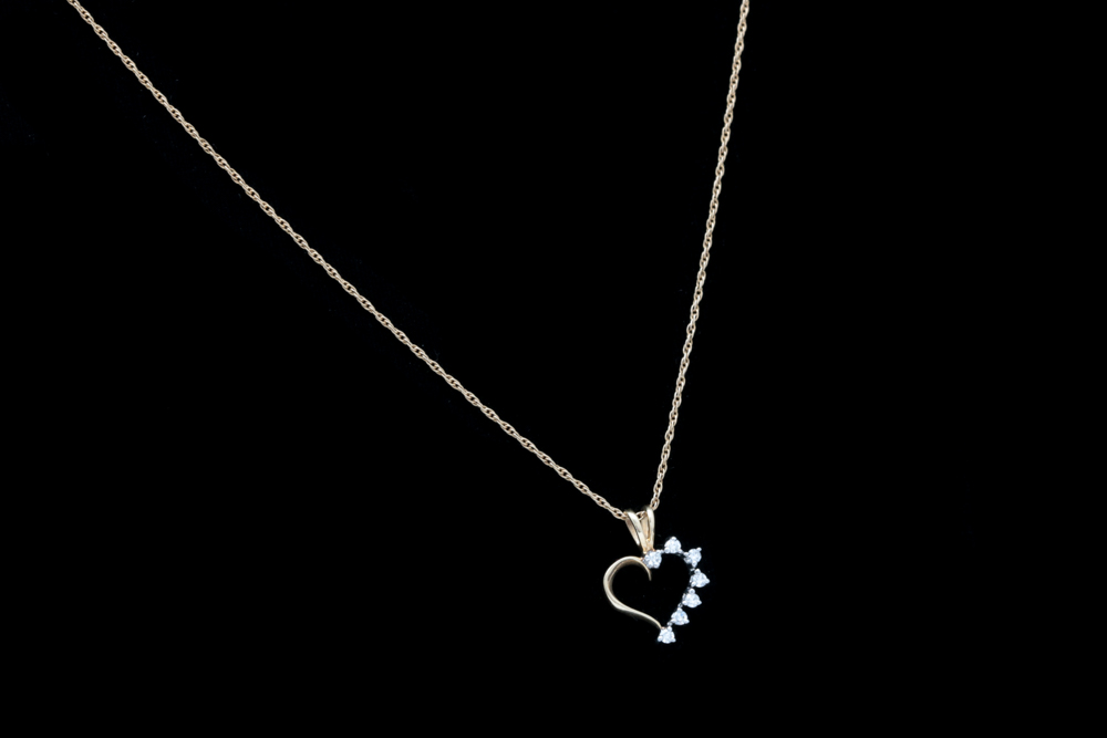 A 14K Two-Tone Gold and Diamond Heart Pendant with Chain