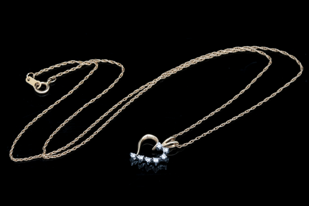 A 14K Two-Tone Gold and Diamond Heart Pendant with Chain