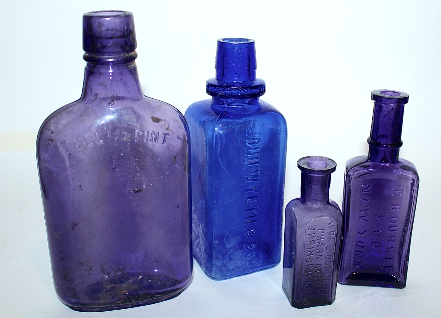 Antique & Vintage Colored Glass Bottles