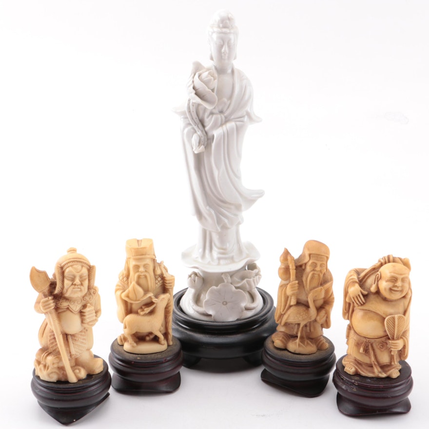 Collection of Asian Figurines with Stands