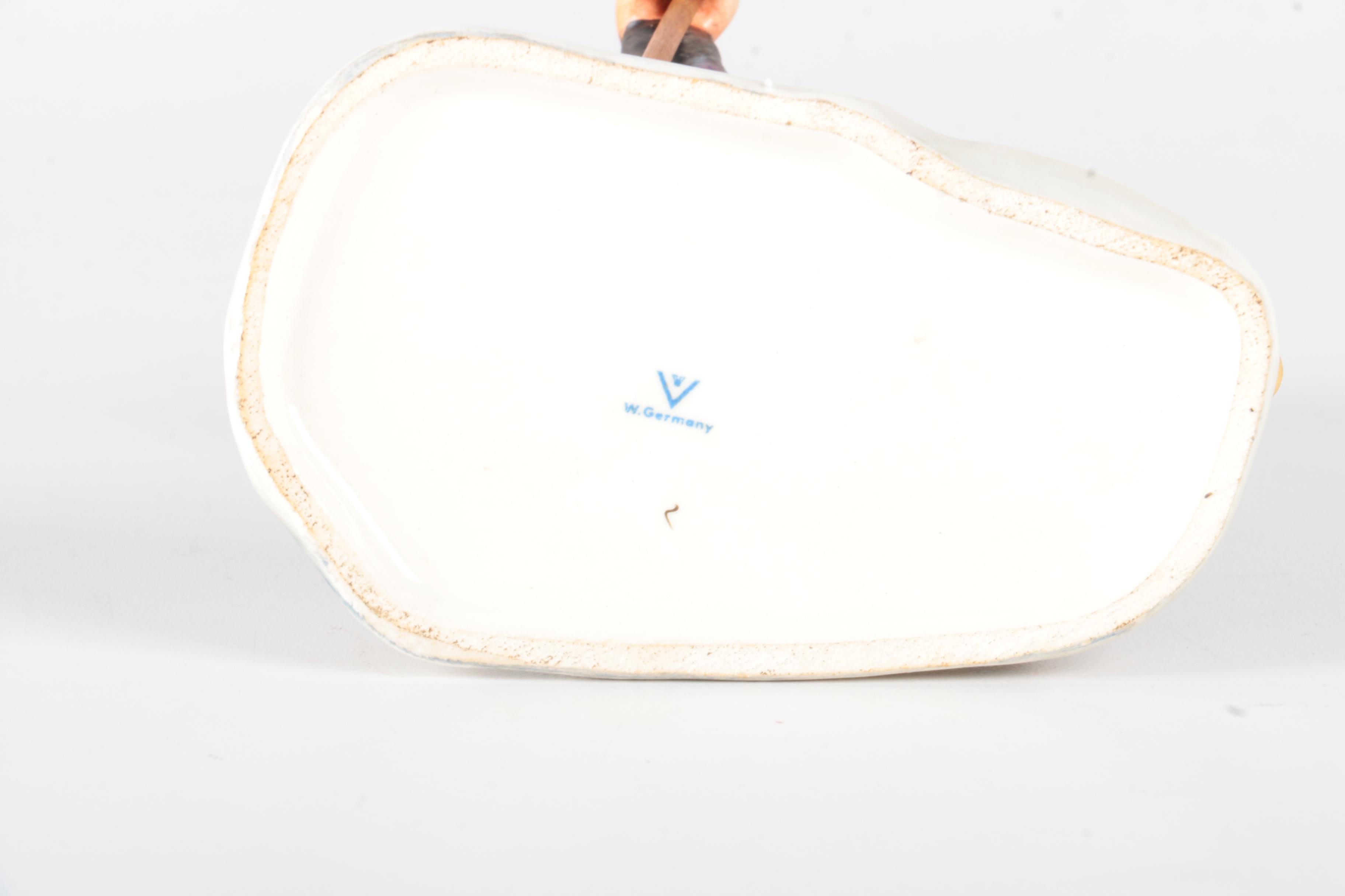 Porcelain Hummel Figurines Featuring "March Winds"