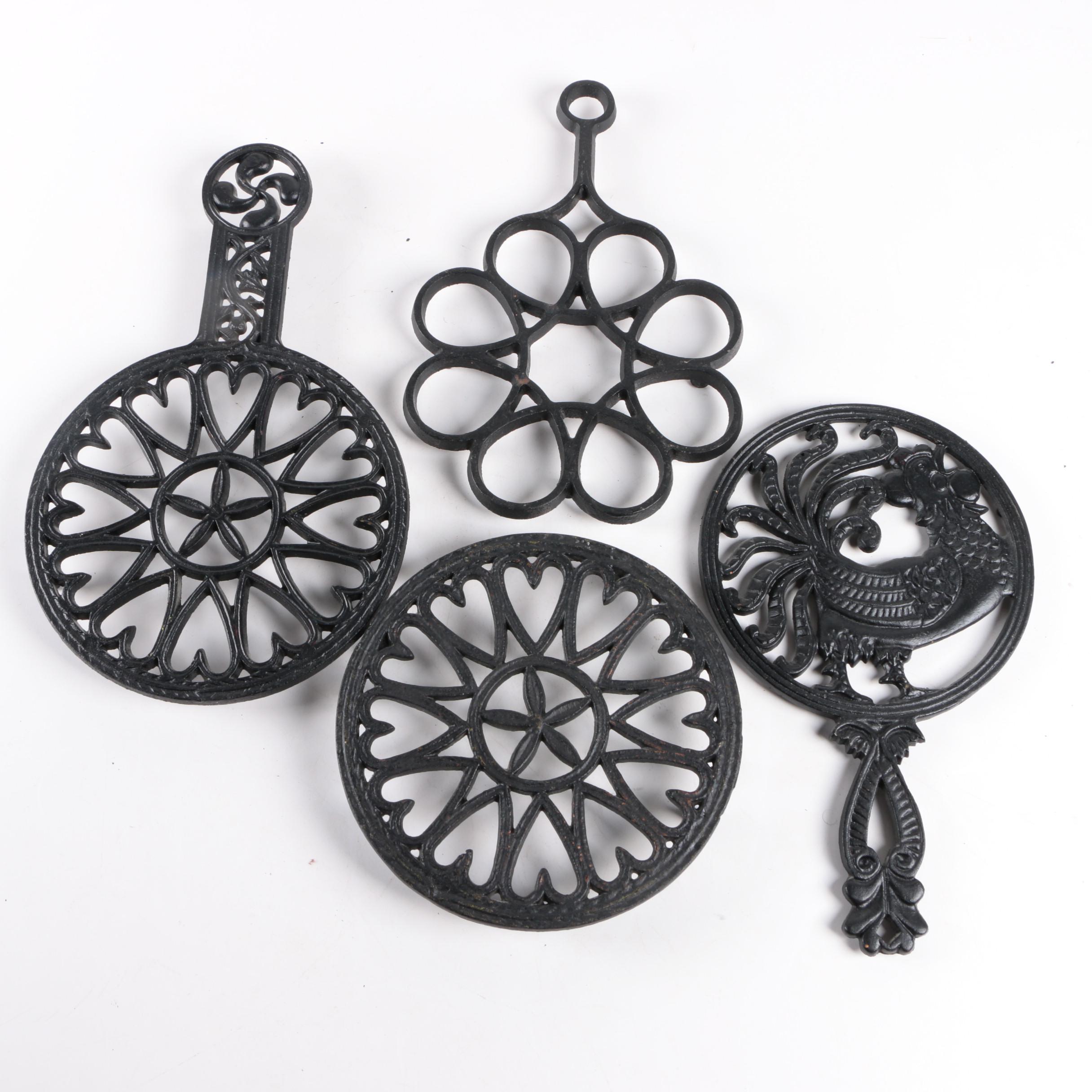 Vintage Cast Iron Trivets Including John Zimmerman Harner