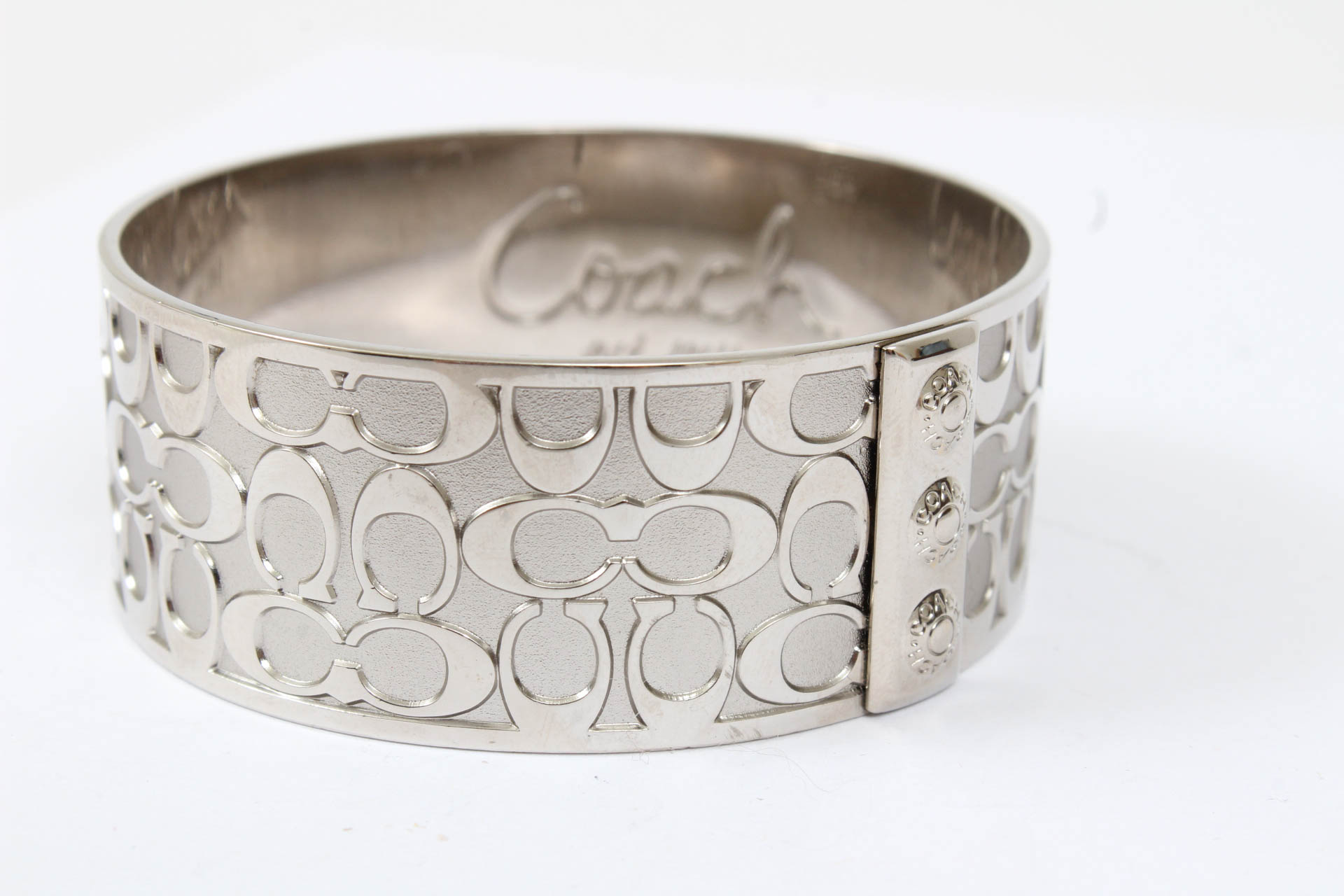 Coach Silver Tone Signature Bangle Bracelet