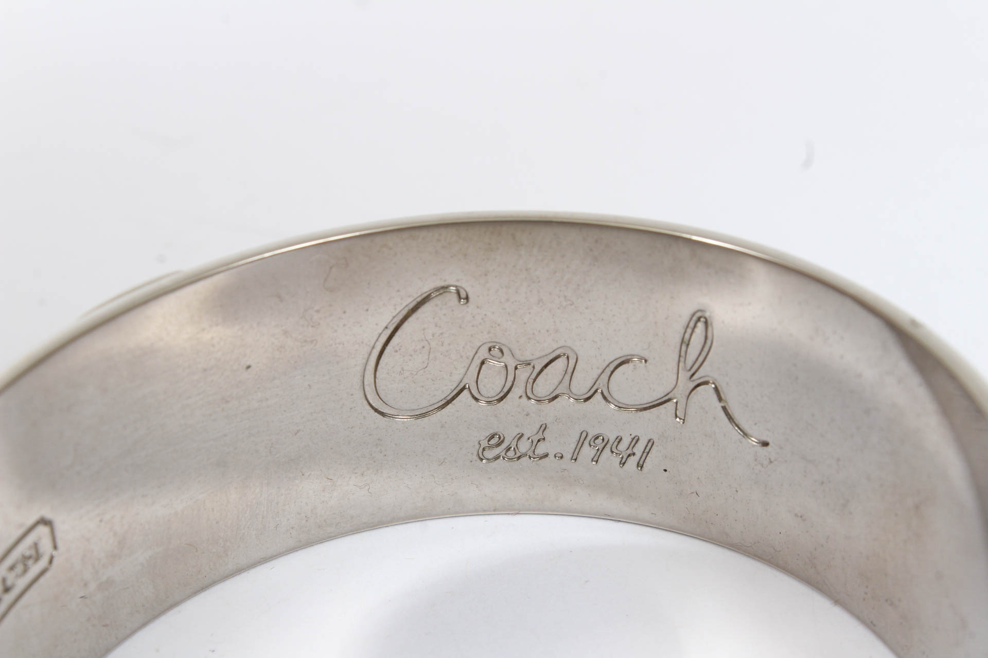 Coach Silver Tone Signature Bangle Bracelet
