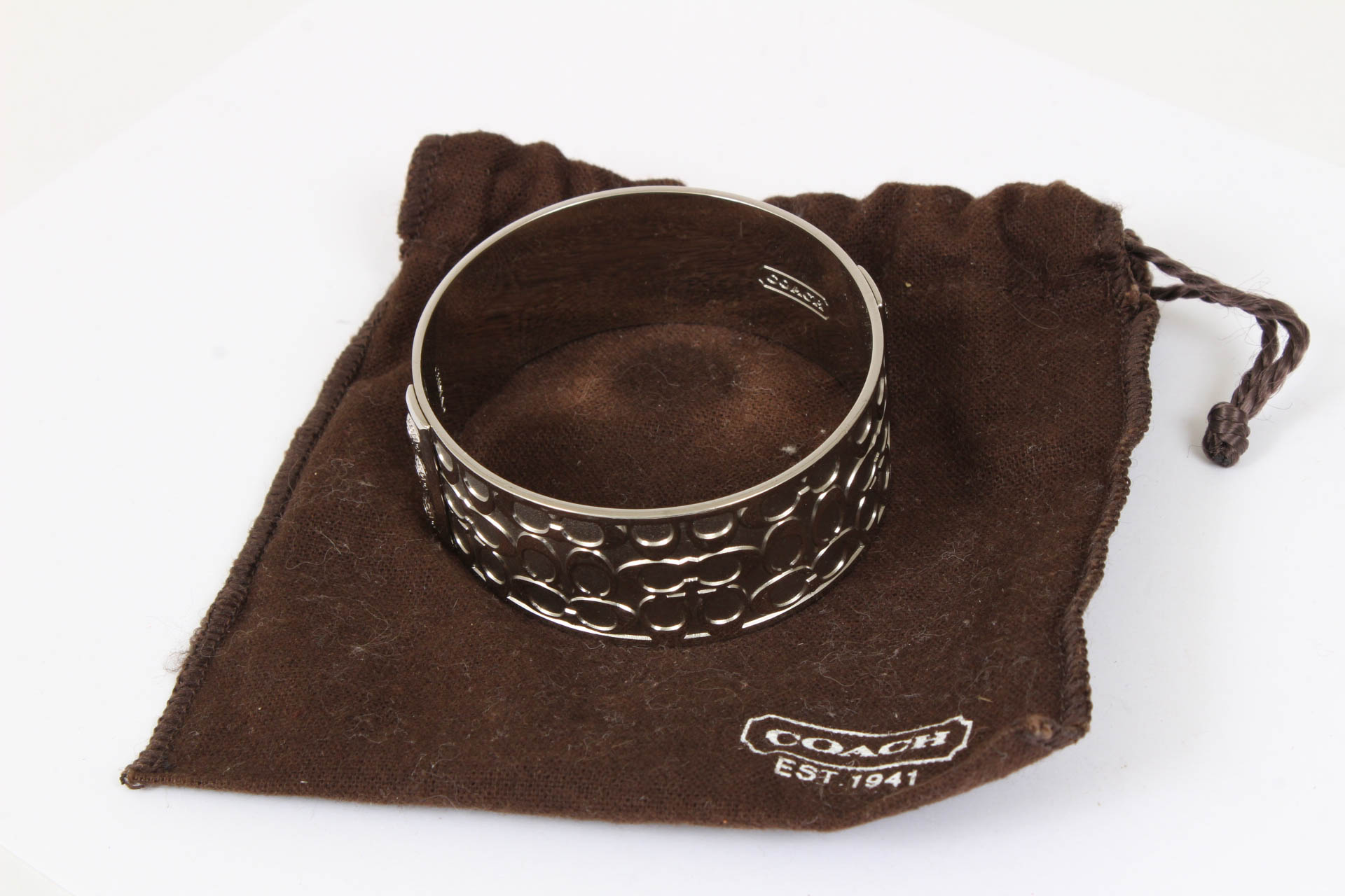 Coach Silver Tone Signature Bangle Bracelet
