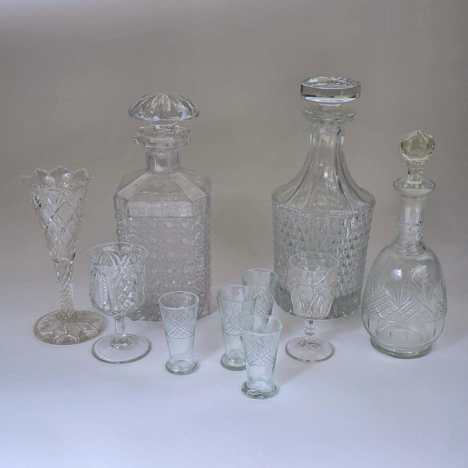 Collection of Crystal Decanters and Shot Glasses