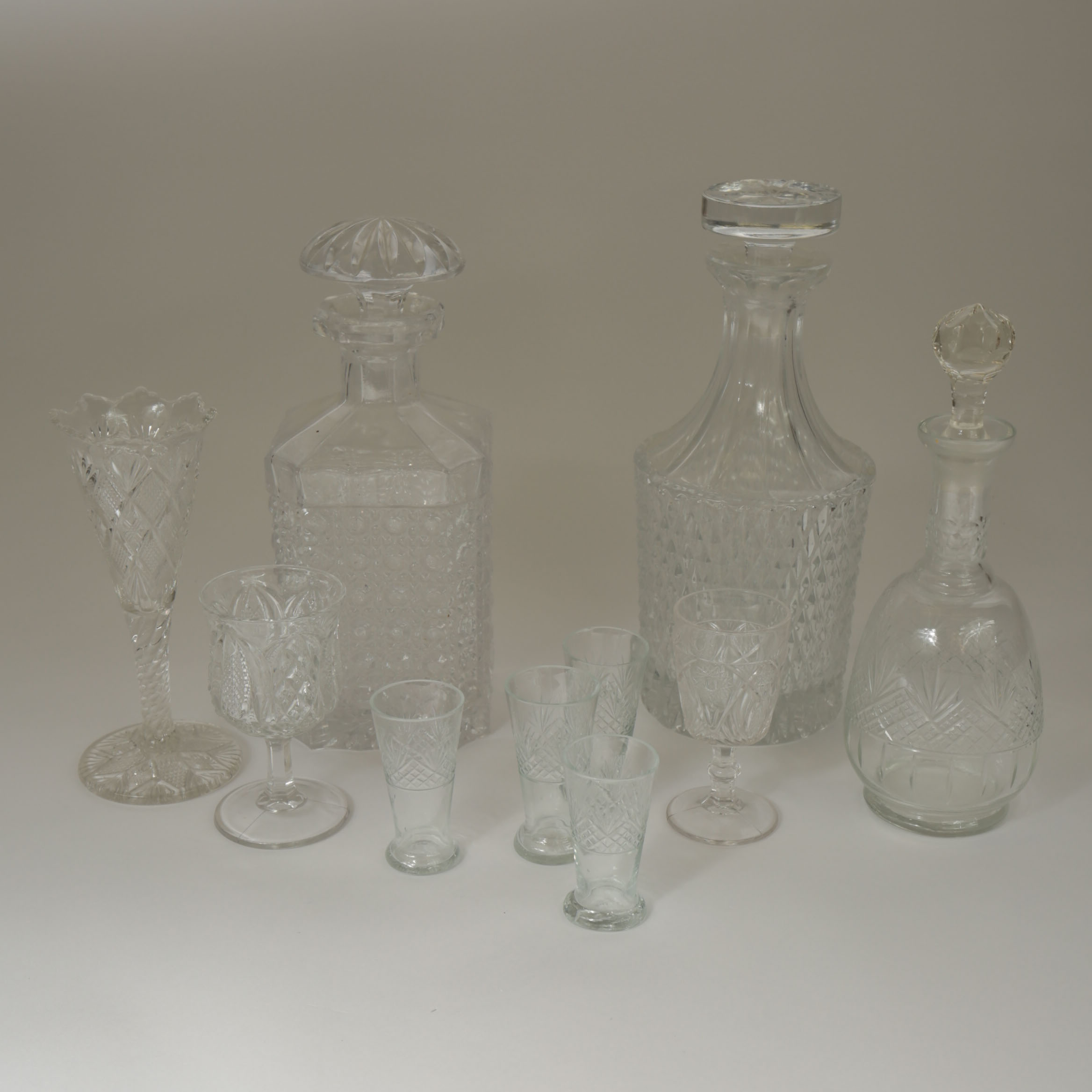Collection of Crystal Decanters and Shot Glasses
