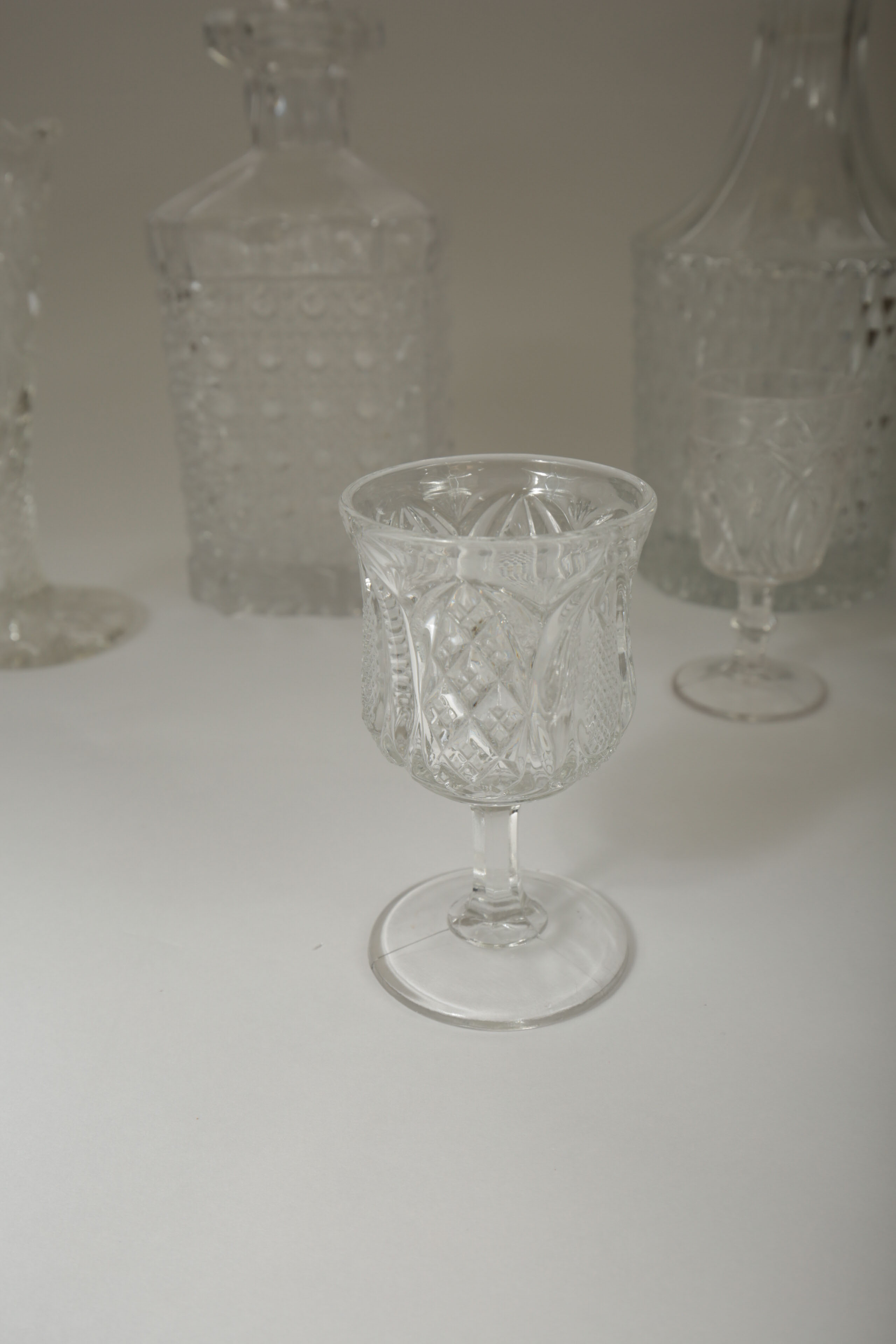 Collection of Crystal Decanters and Shot Glasses