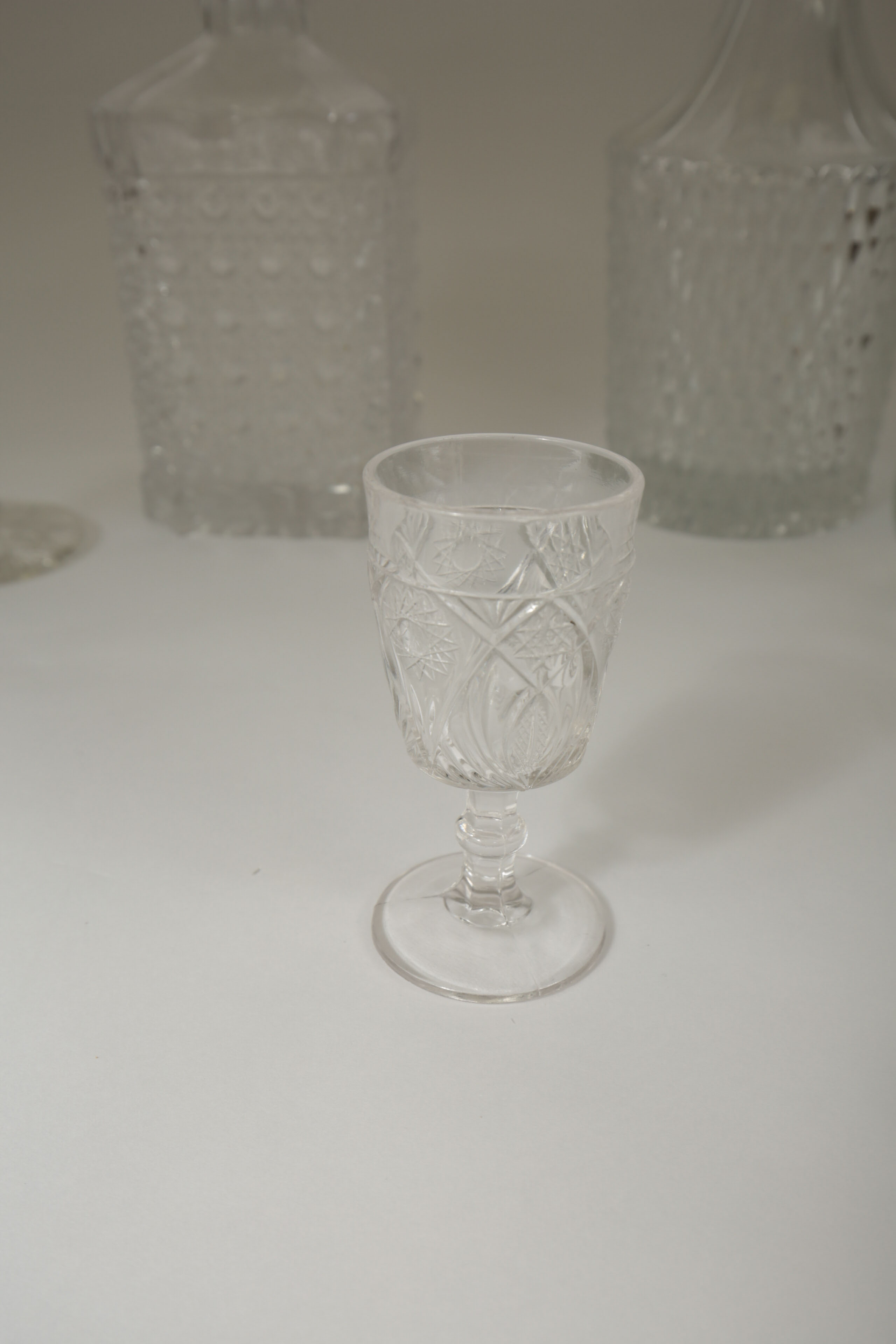 Collection of Crystal Decanters and Shot Glasses