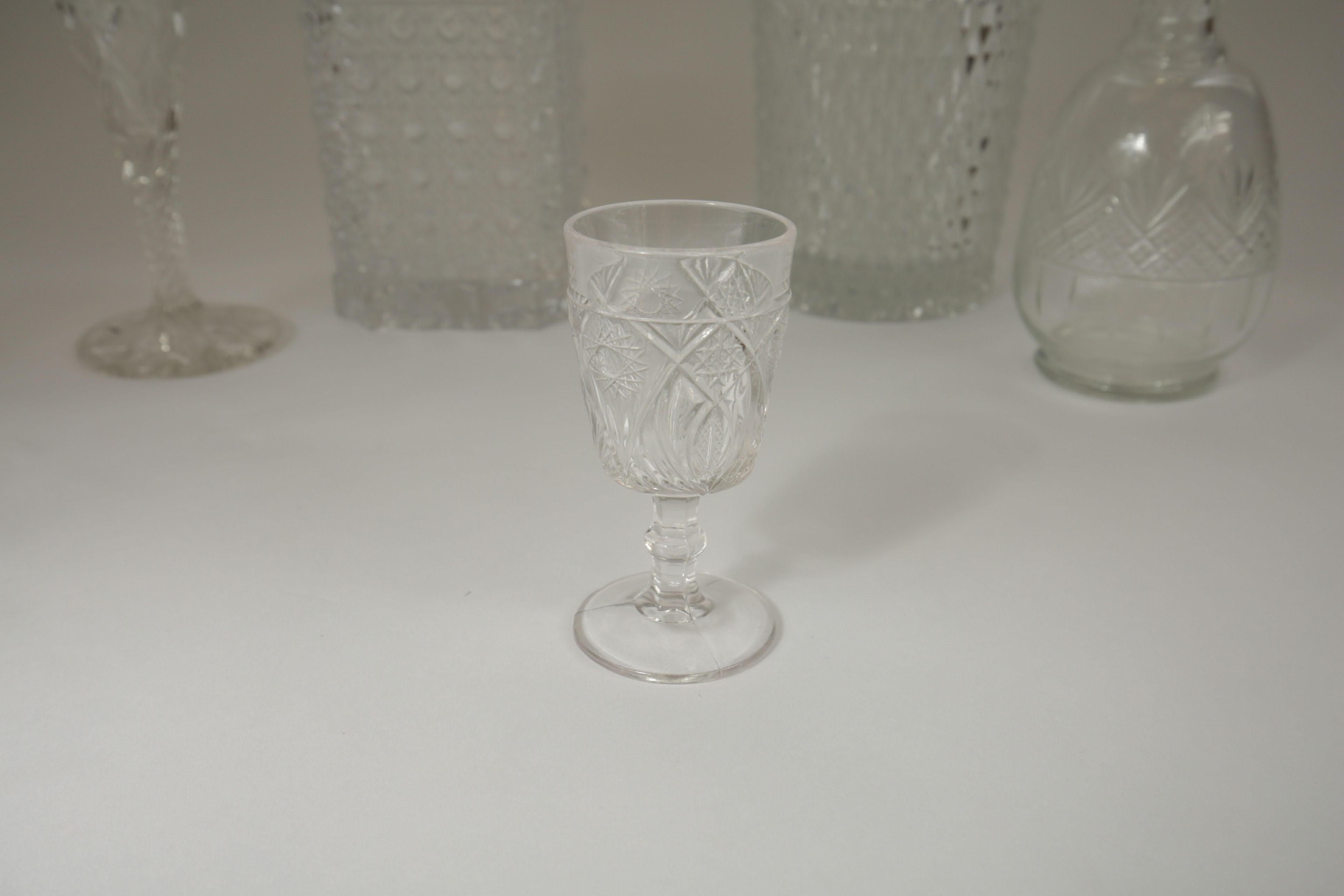 Collection of Crystal Decanters and Shot Glasses